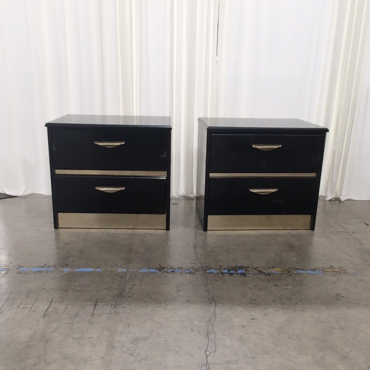 Black Lacquer Four-Drawer Dresser with Gold Pulls