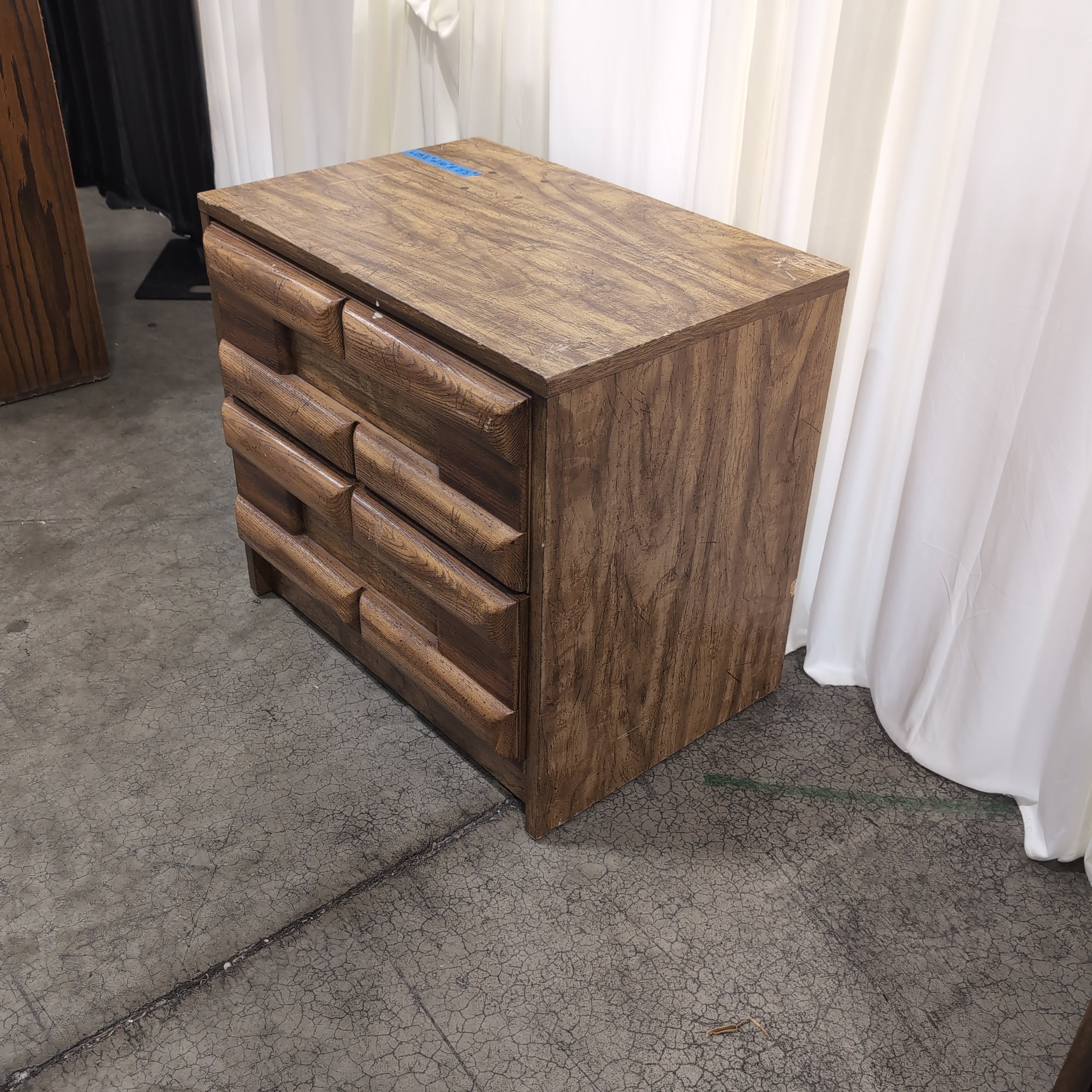Brown Sculpted Wood Nightstand