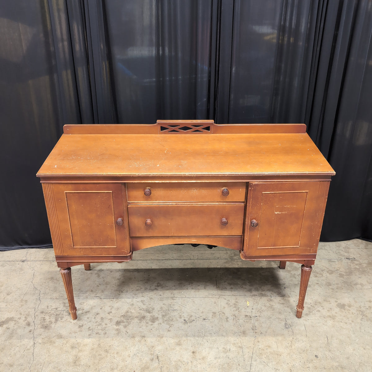 Warm Toned Wood Buffet with Fluted Legs