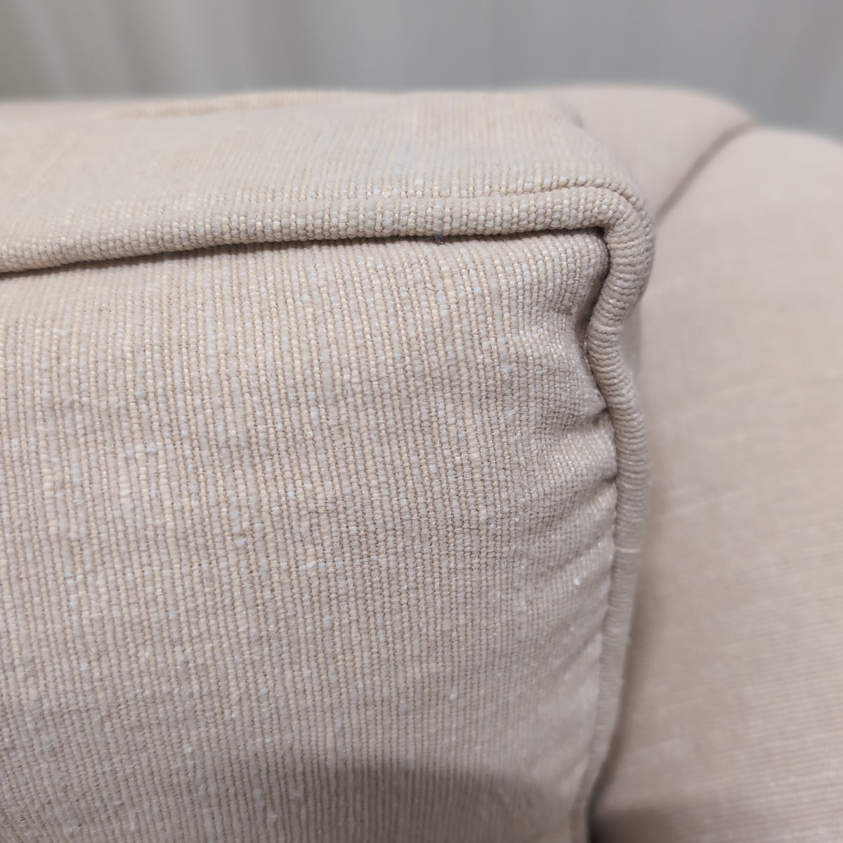 Beige Upholstered Rolled Arm Couch