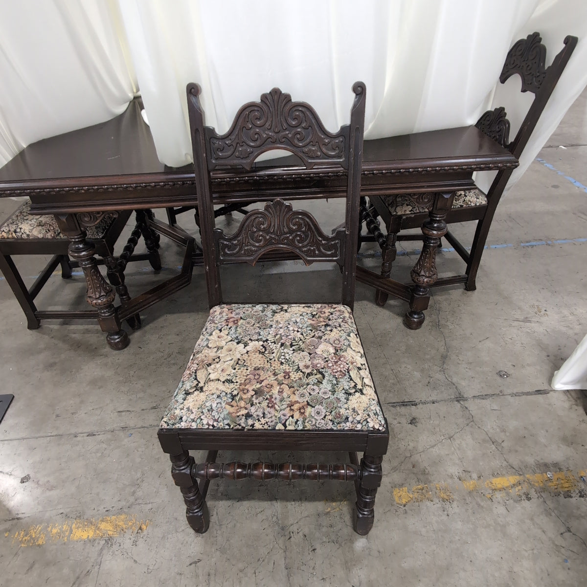 Traditional Dark Wood Dining Table with Upholstered Chairs