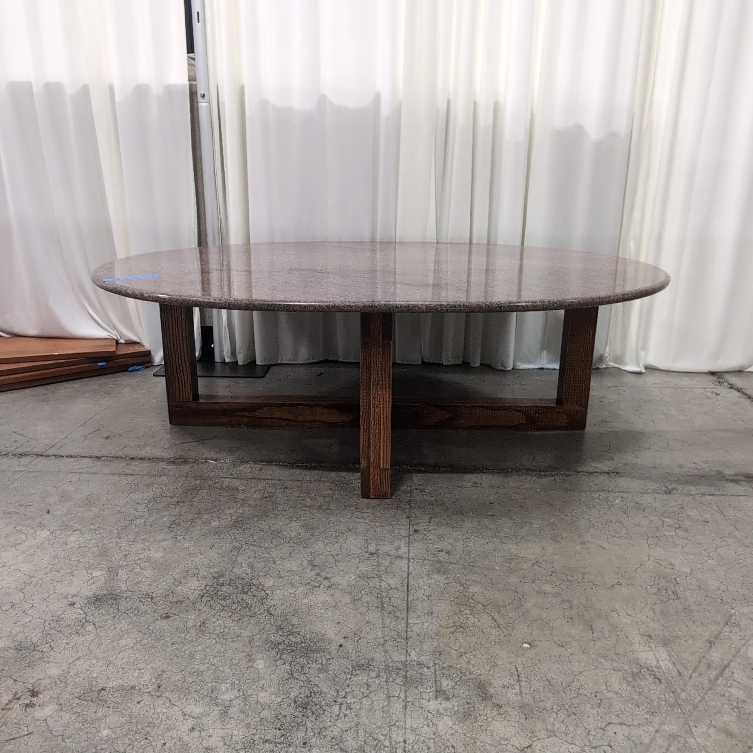 Round Light Granite Dining Table with Scrolled Iron Base