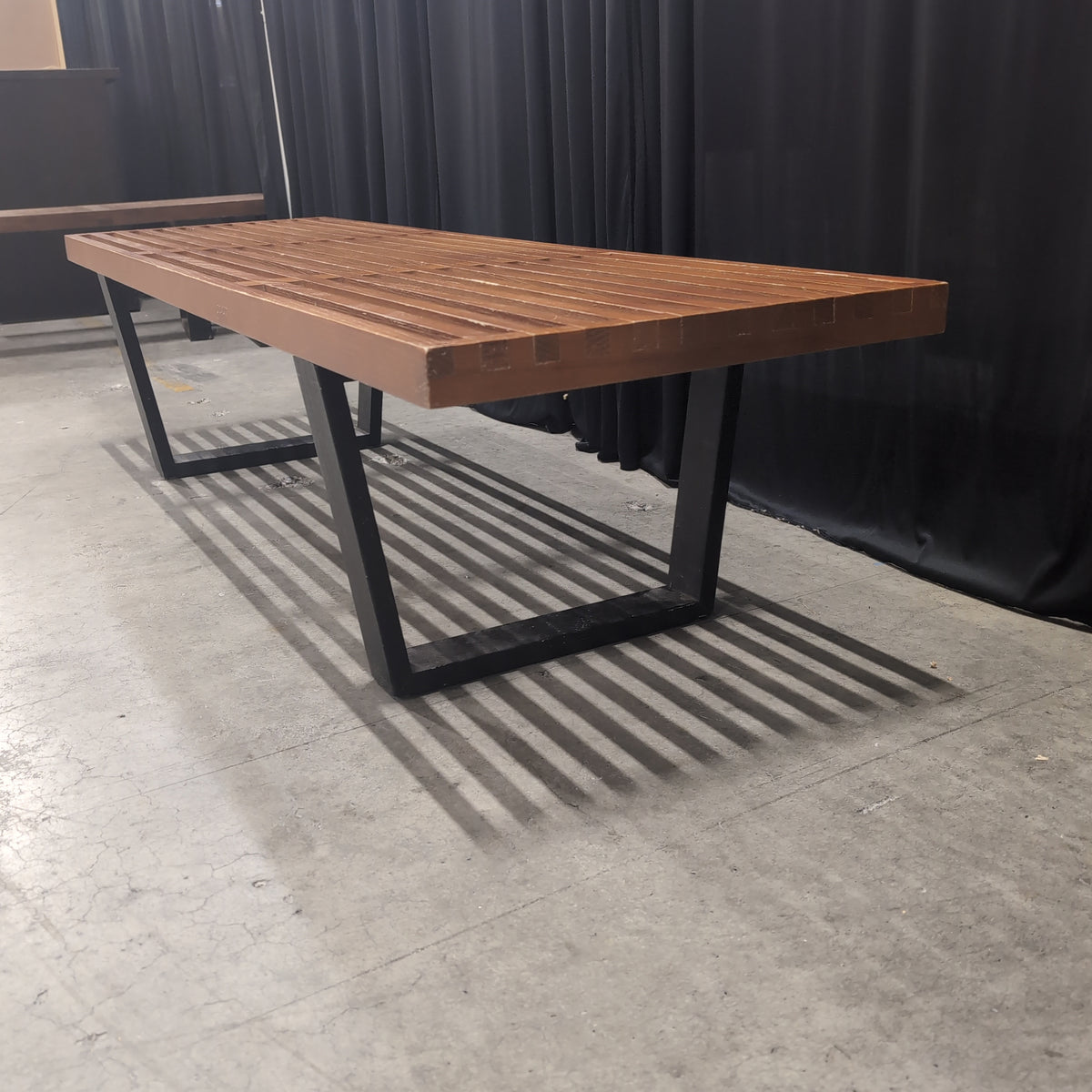 Brown Slatted Outdoor Bench in Hardwood