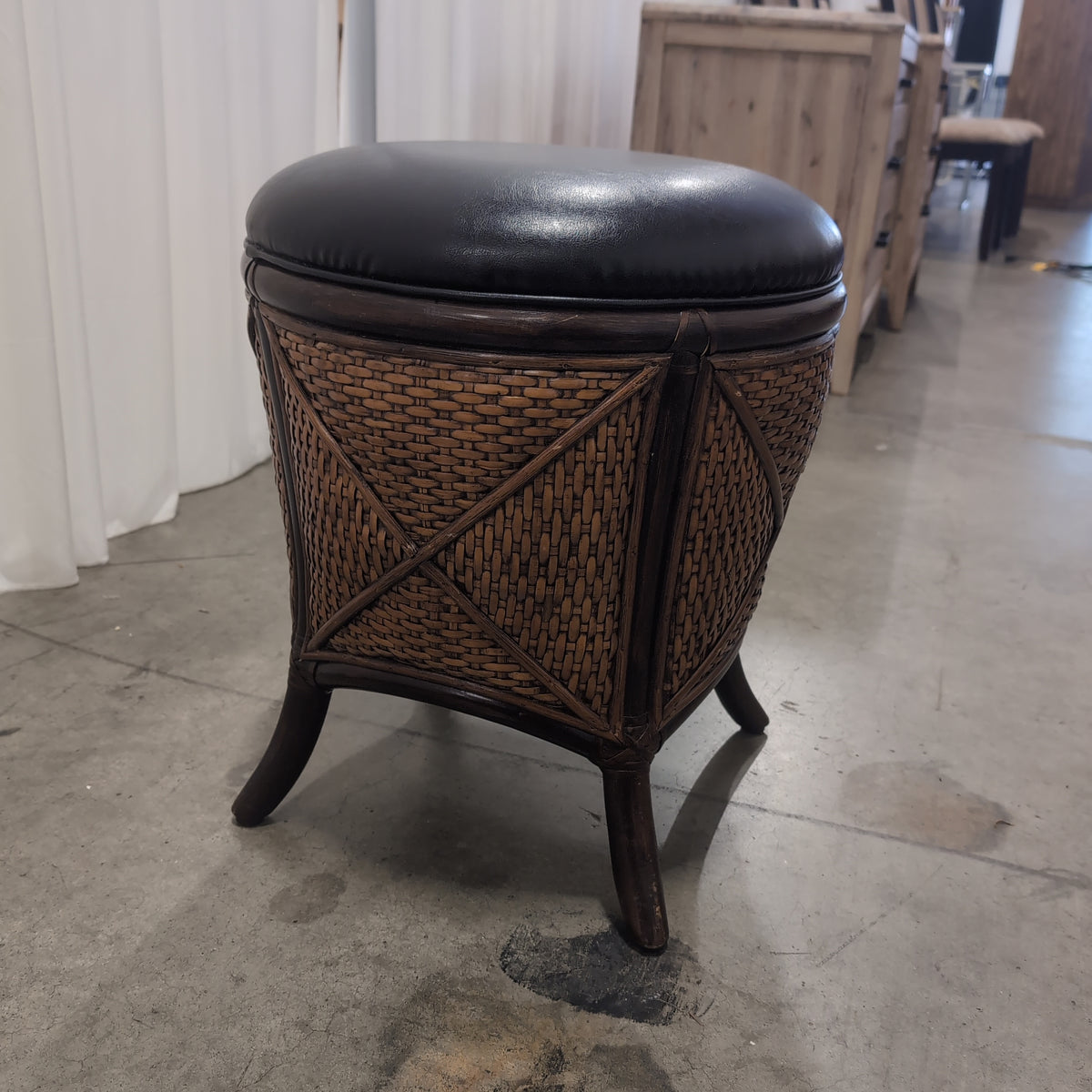 Round Woven Rattan Ottoman with Dark Upholstery