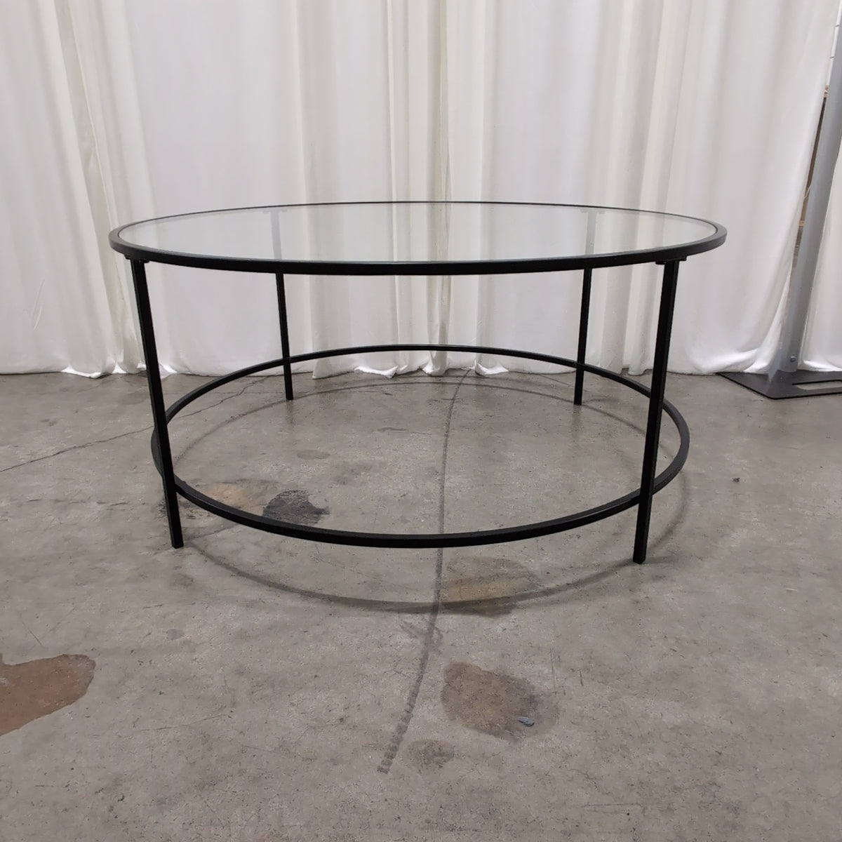 Round Glass Coffee Table with Black Metal Frame