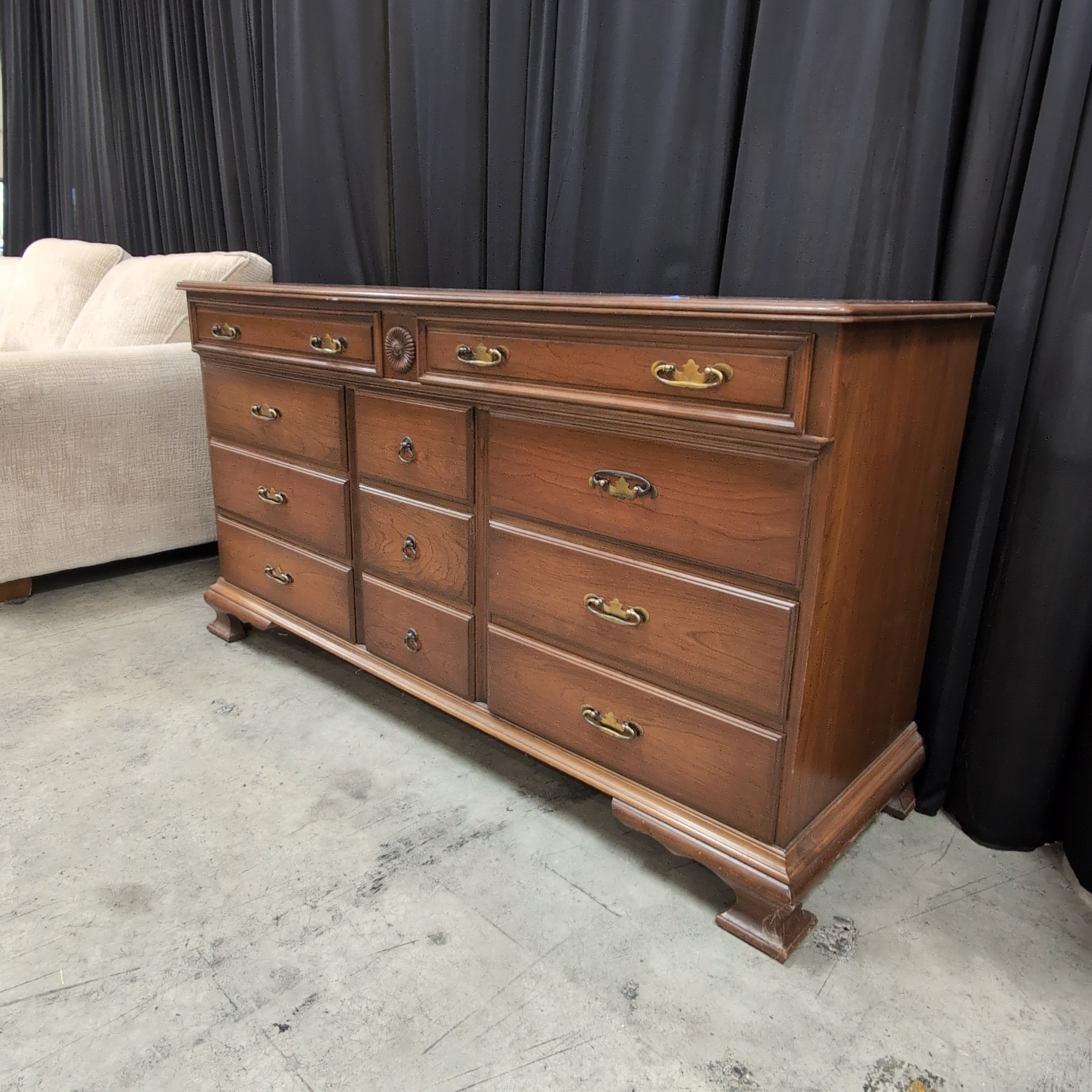 Traditional Brown Wood Dresser with Ornate Hardware