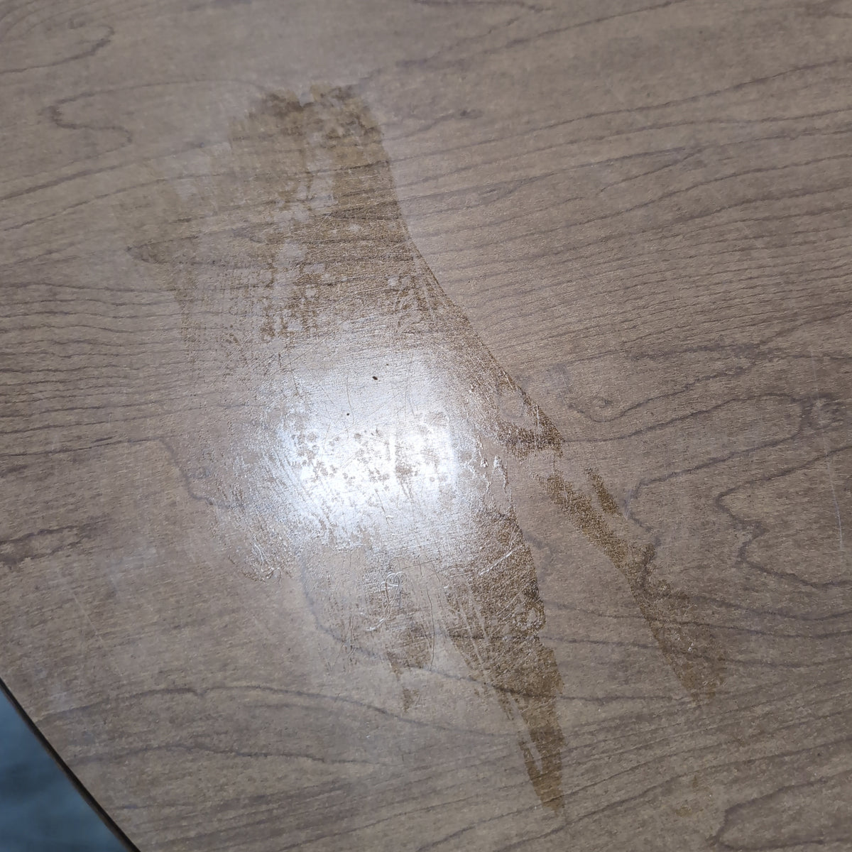 Round Medium Brown Wood Dining Table with Leaf Seam