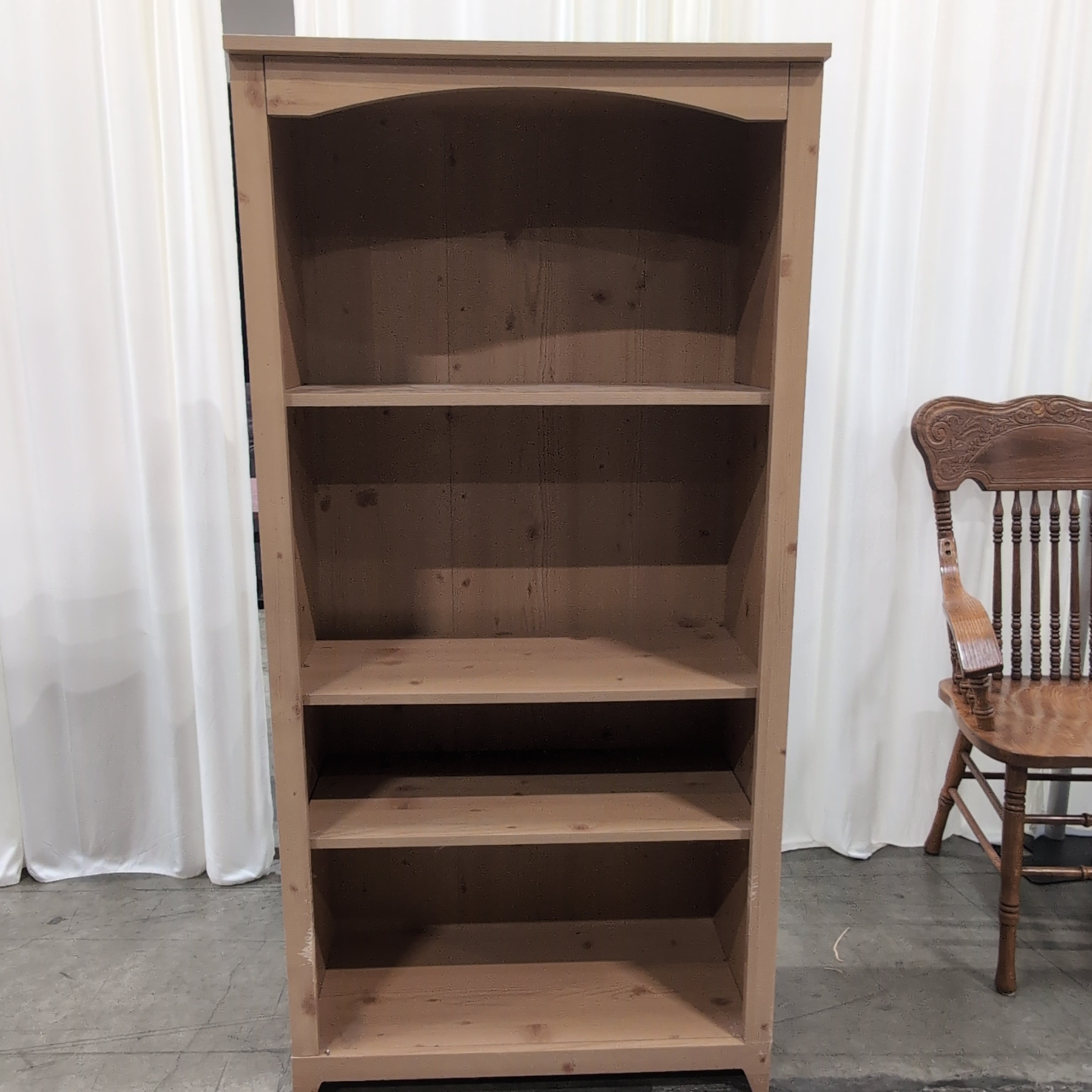Light Wood Four-Shelf Bookcase with Arched Top