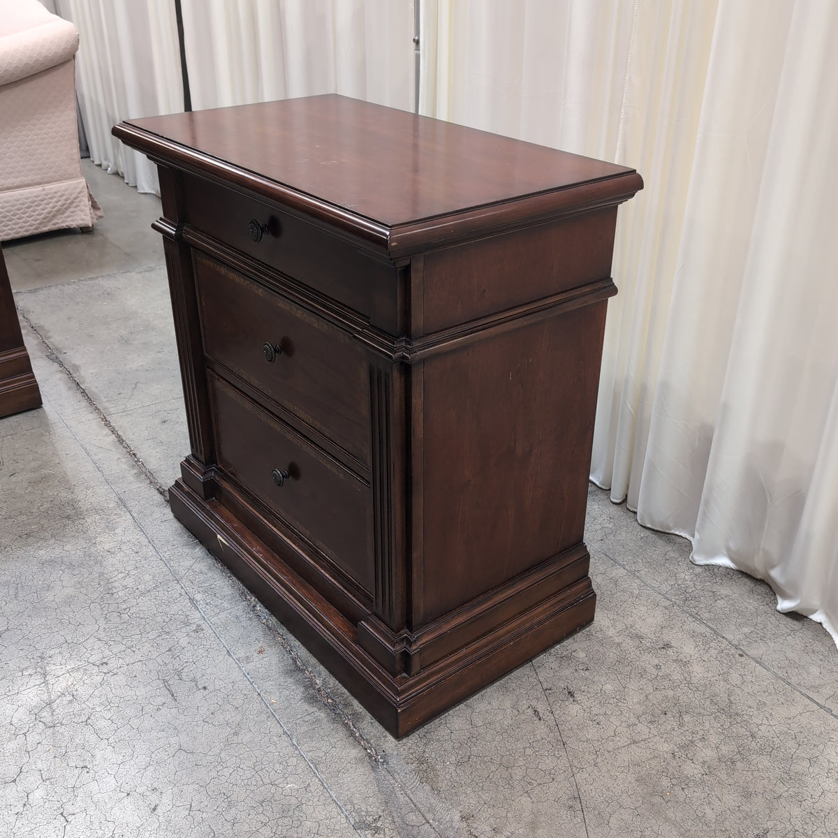 Traditional Dark Wood Three-Drawer Nightstand