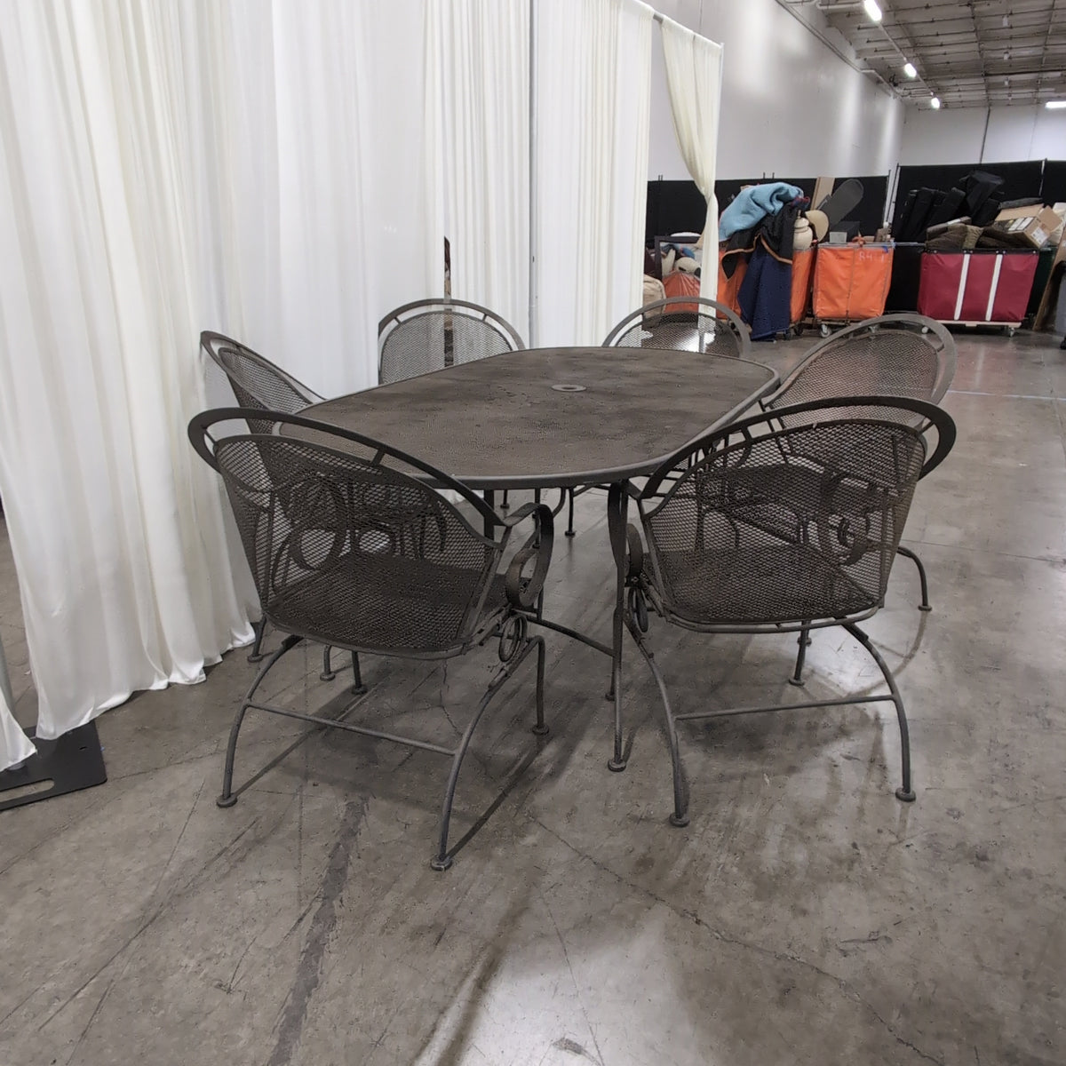 Dark Metal Oval Outdoor Table with Umbrella Hole