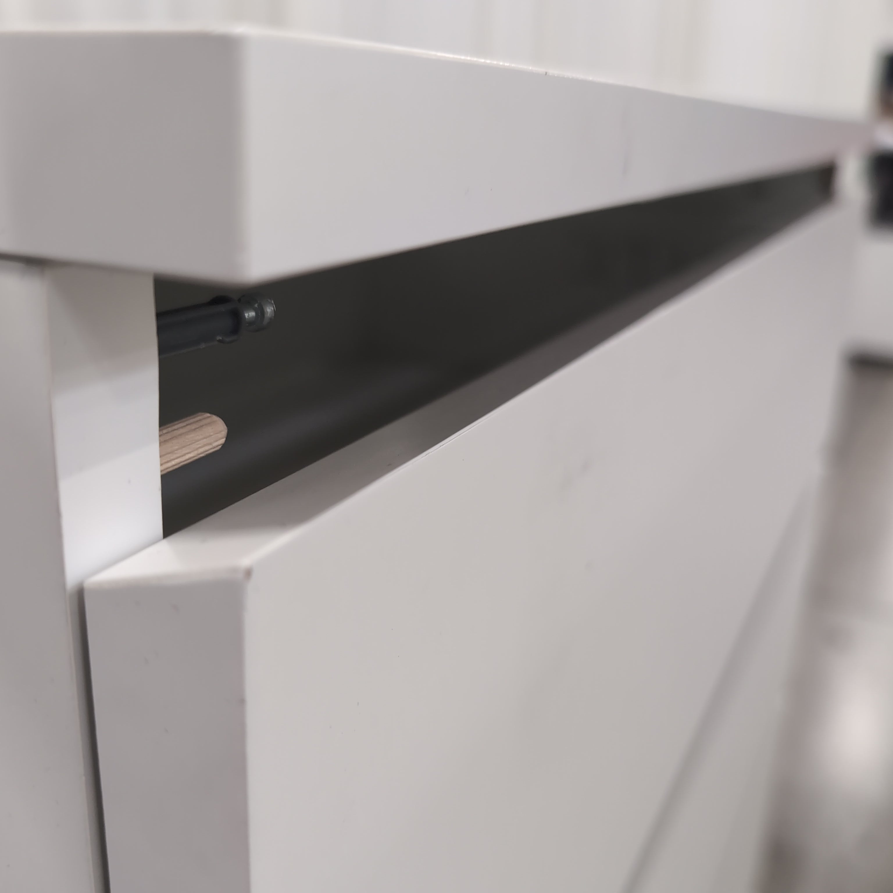 White Laminate Four-Drawer Dresser