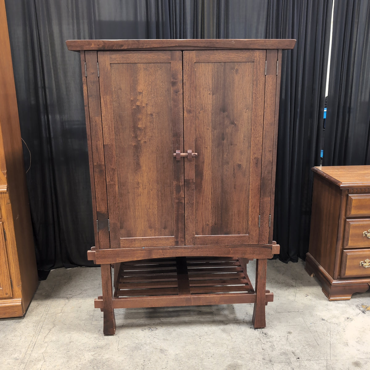 Rustic Dark Wood Two-Door Armoire with Slatted Base