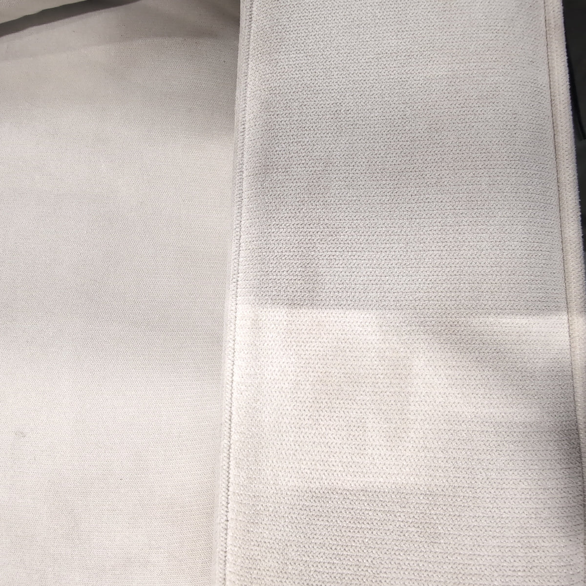 Tan Fabric Three-Seat Reclining Couch with Piped Edges