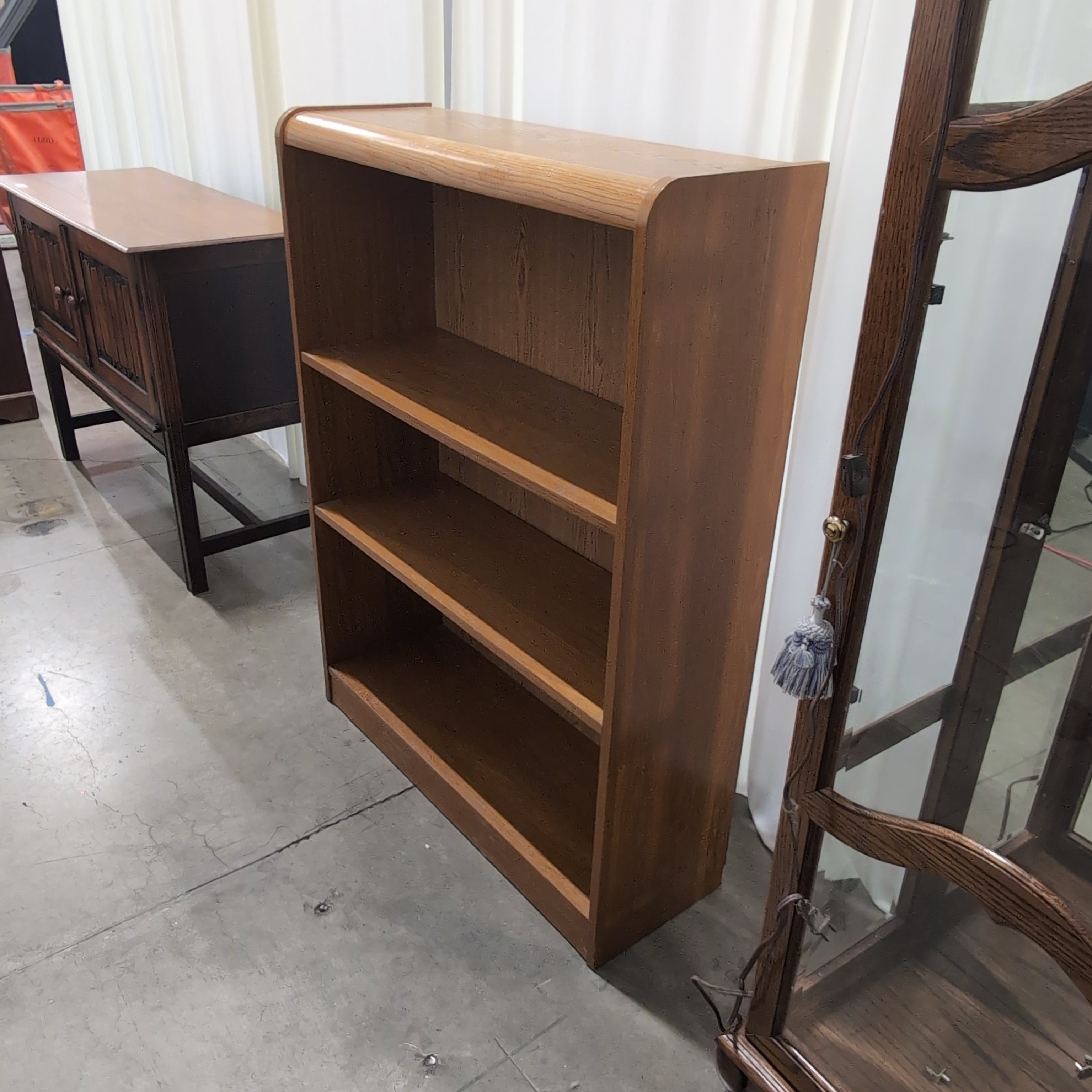 Natural Wood Four-Shelf Bookcase with Curved Sides