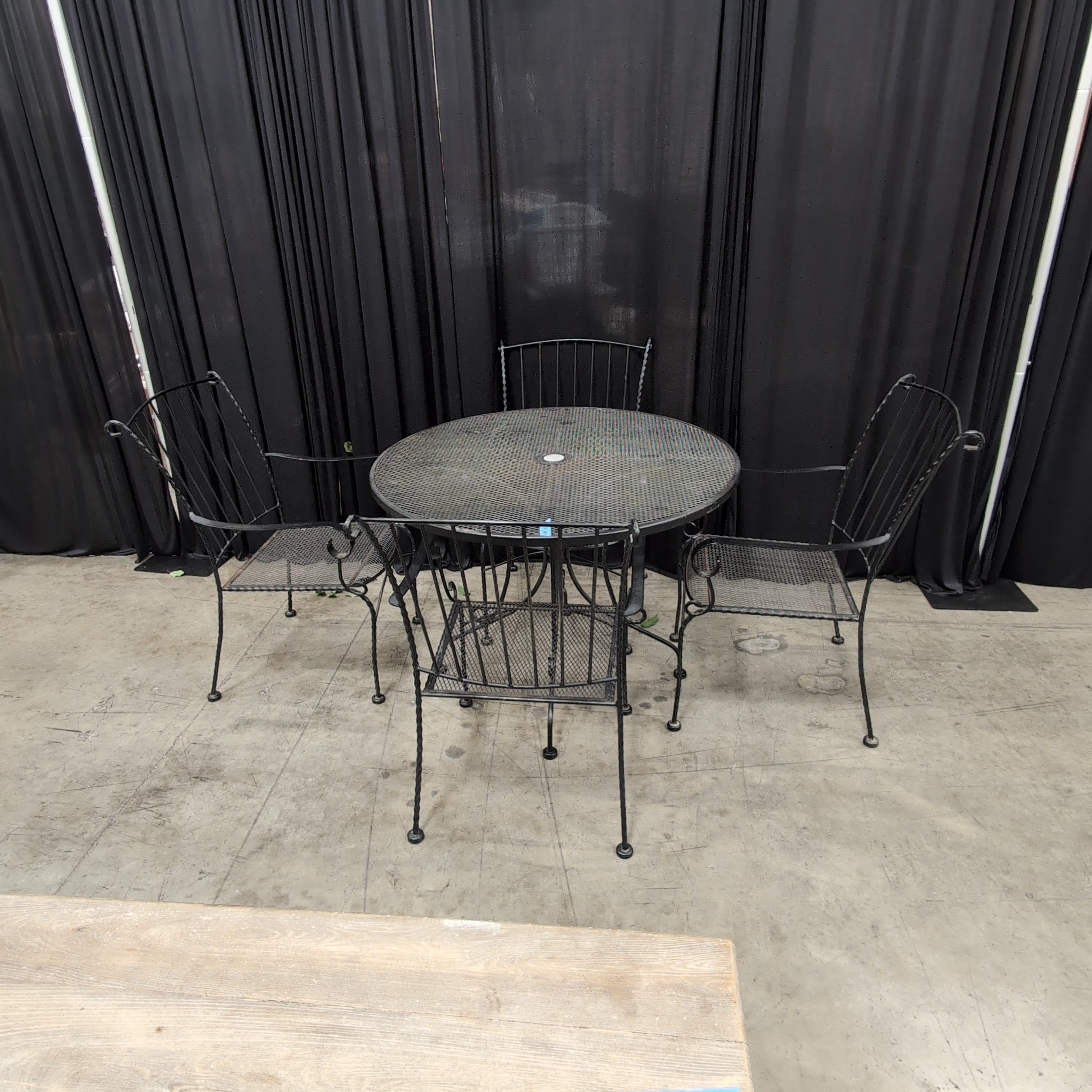Black Wrought Iron Round Outdoor Table and Four Chairs