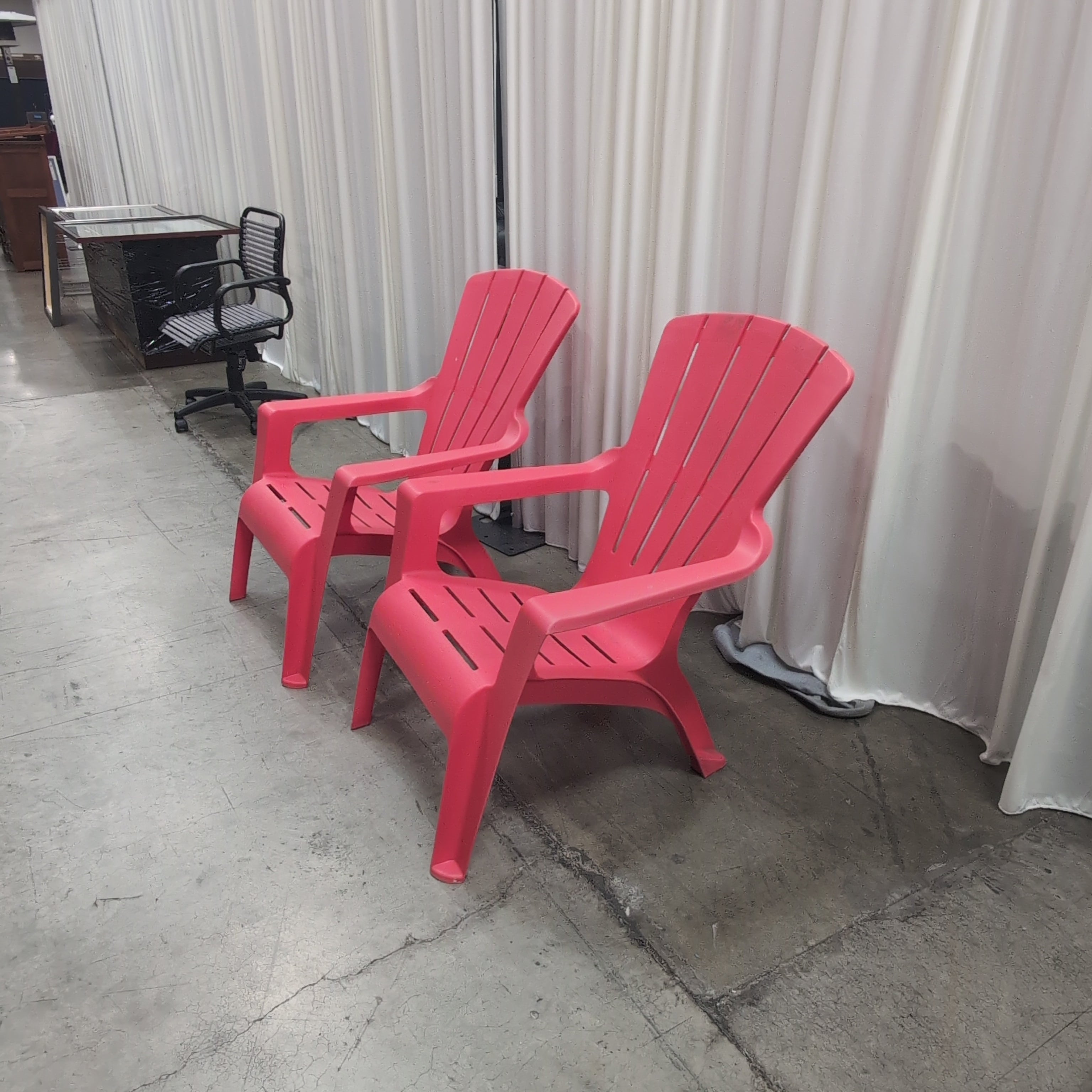 Pair of Red Plastic outdoor chairs