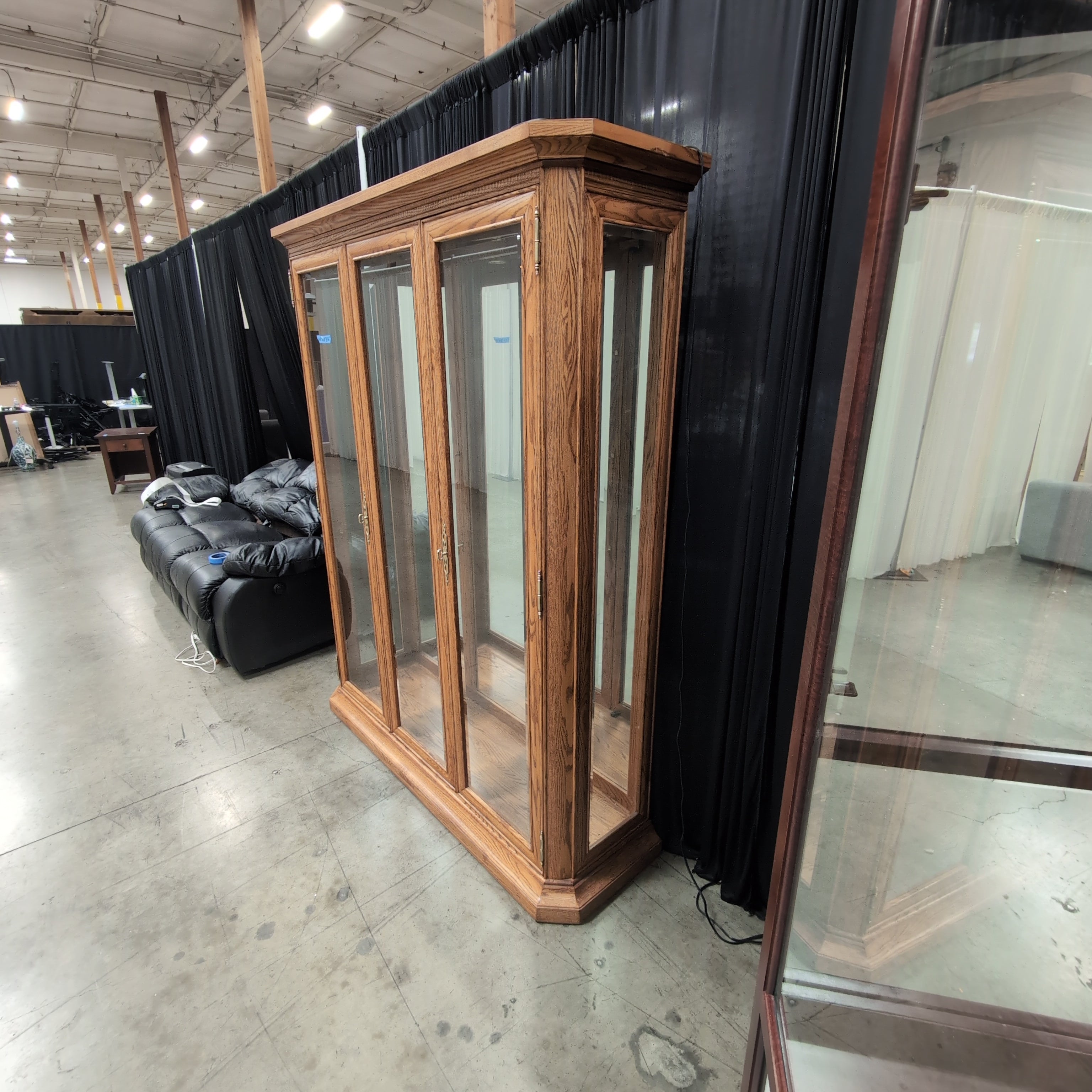 Oak Finish Three-Door China Cabinet with Crown Molding