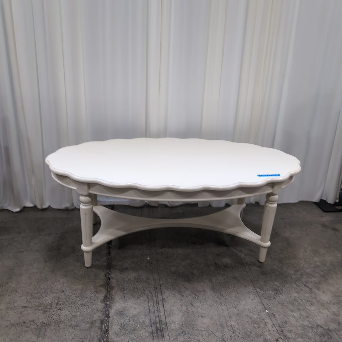 White Scalloped Oval Coffee Table