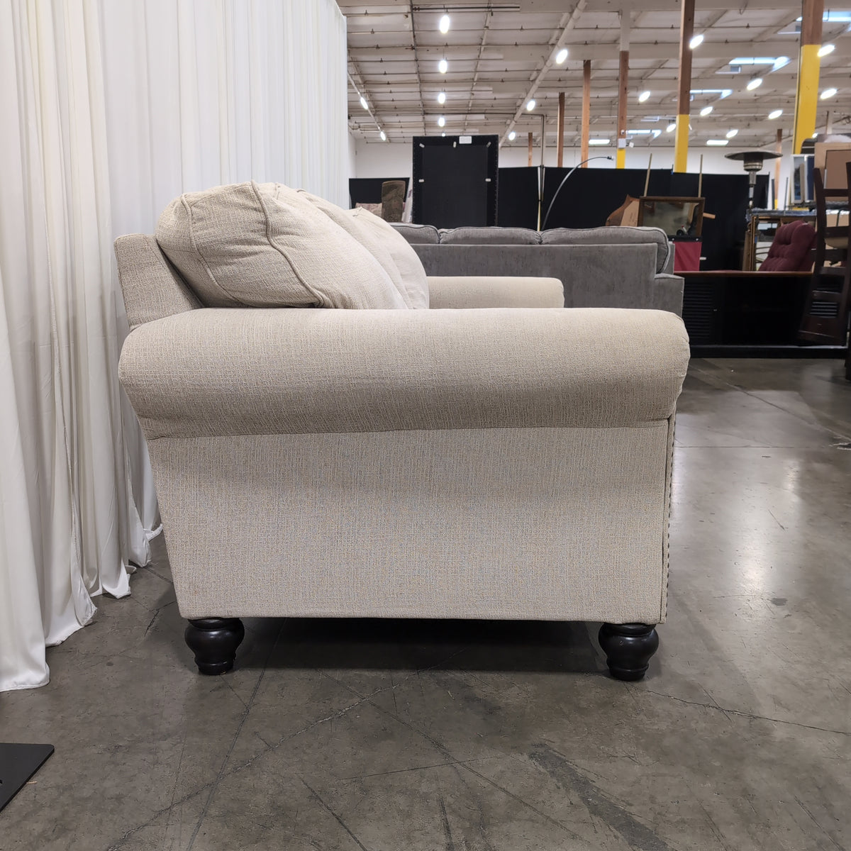 Light Beige Fabric Couch with Nailhead Trim