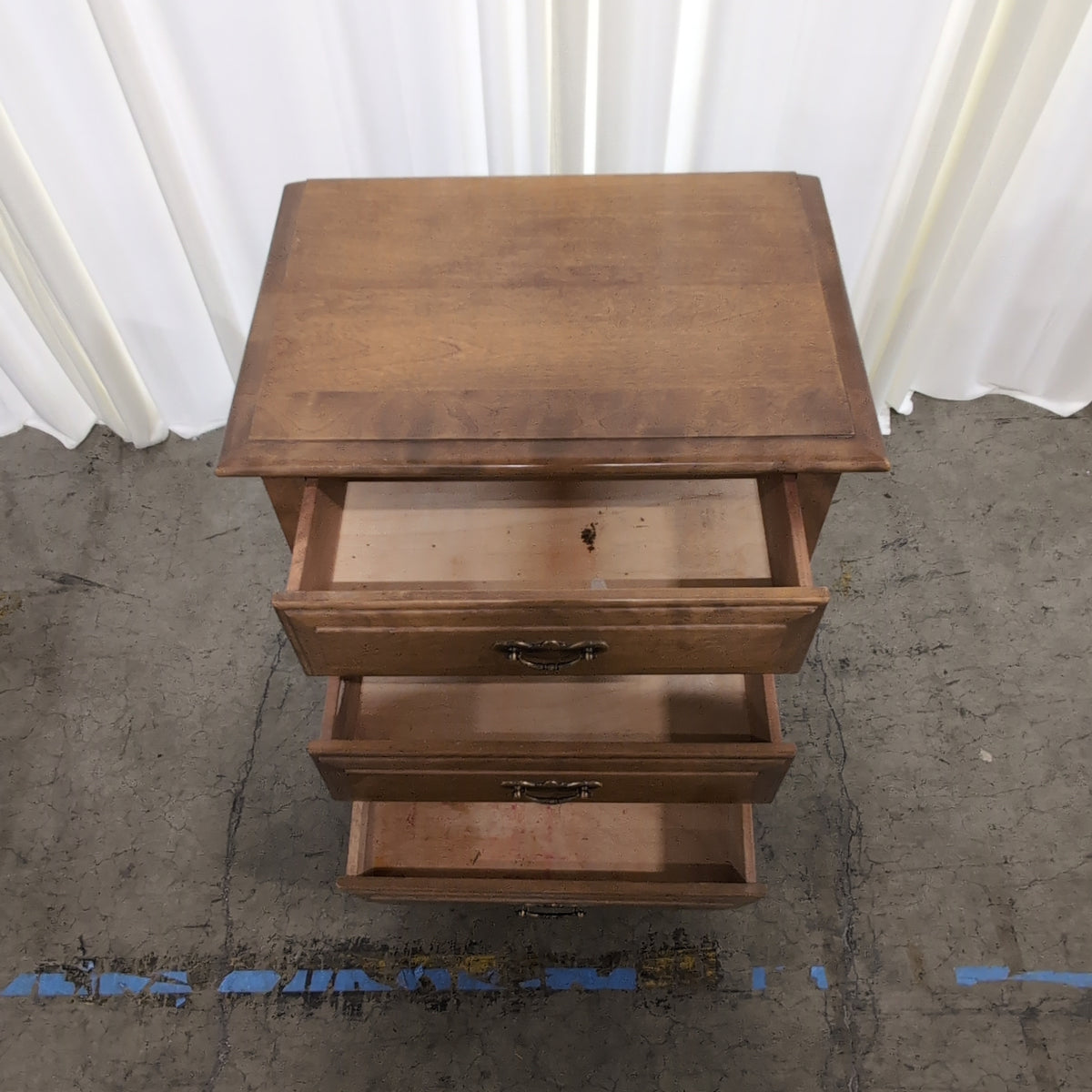 Traditional Brown Wood Nightstand with Three Drawers