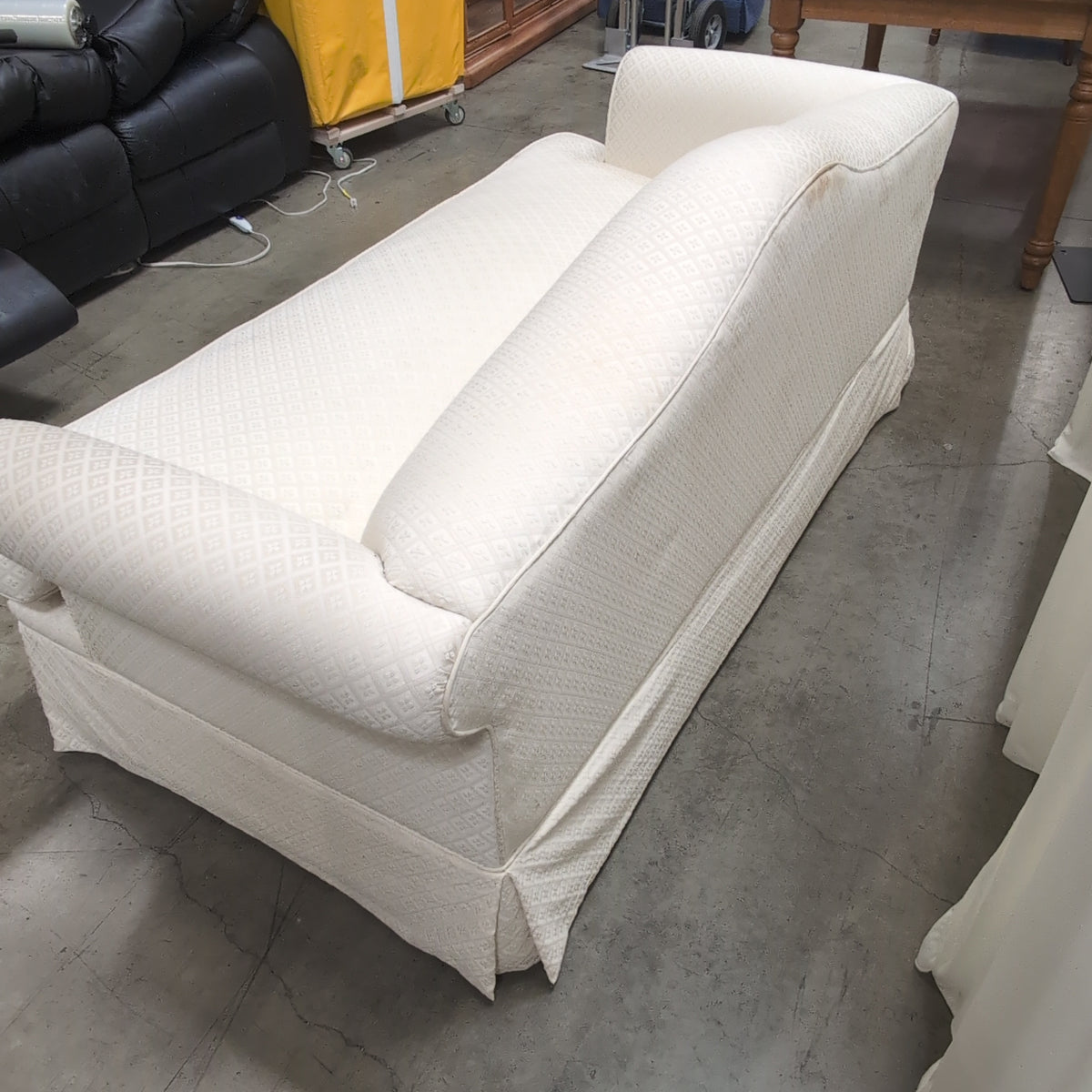 Cream Patterned Fabric Loveseat with Rolled Arms