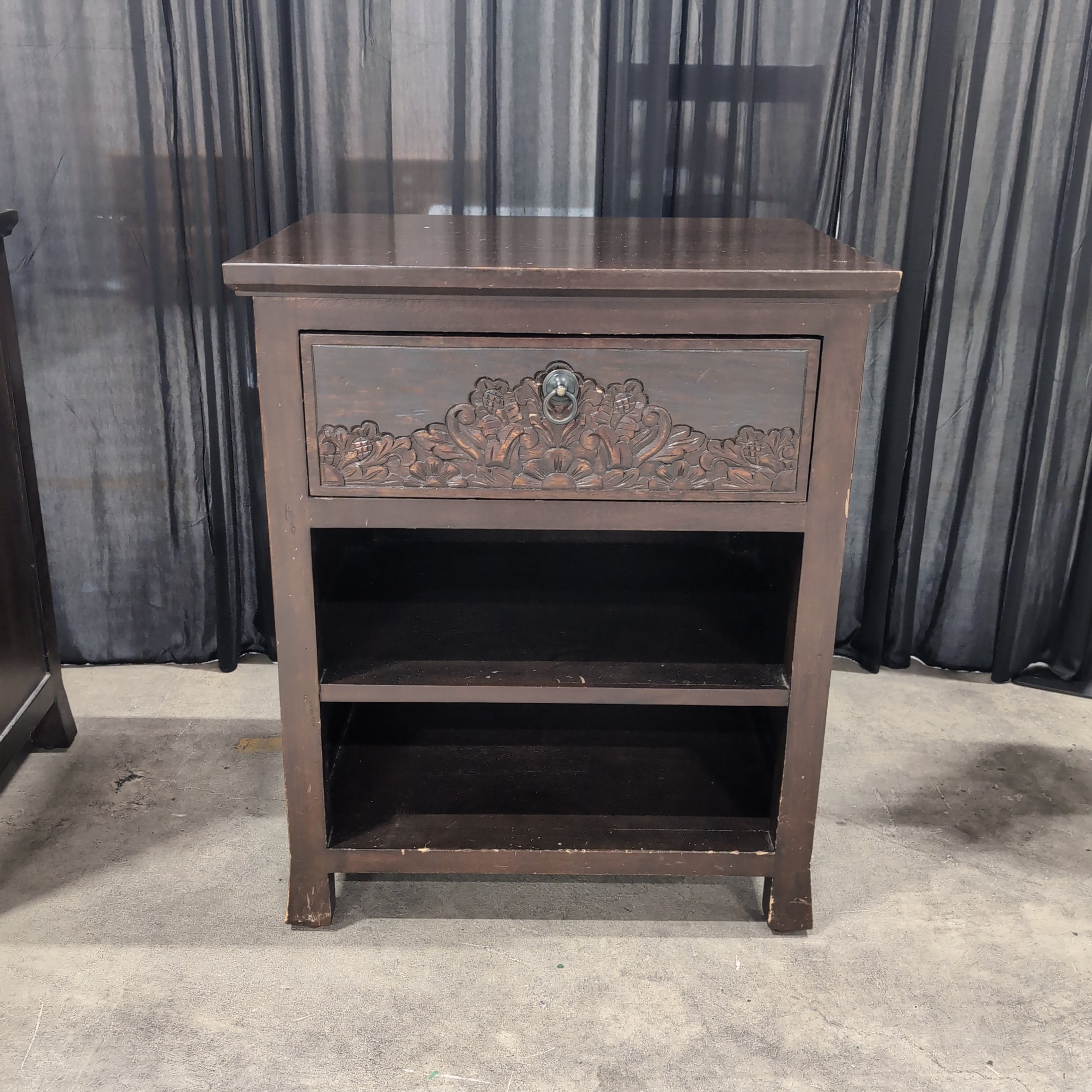Dark Wood Nightstand with Carved Drawer Front