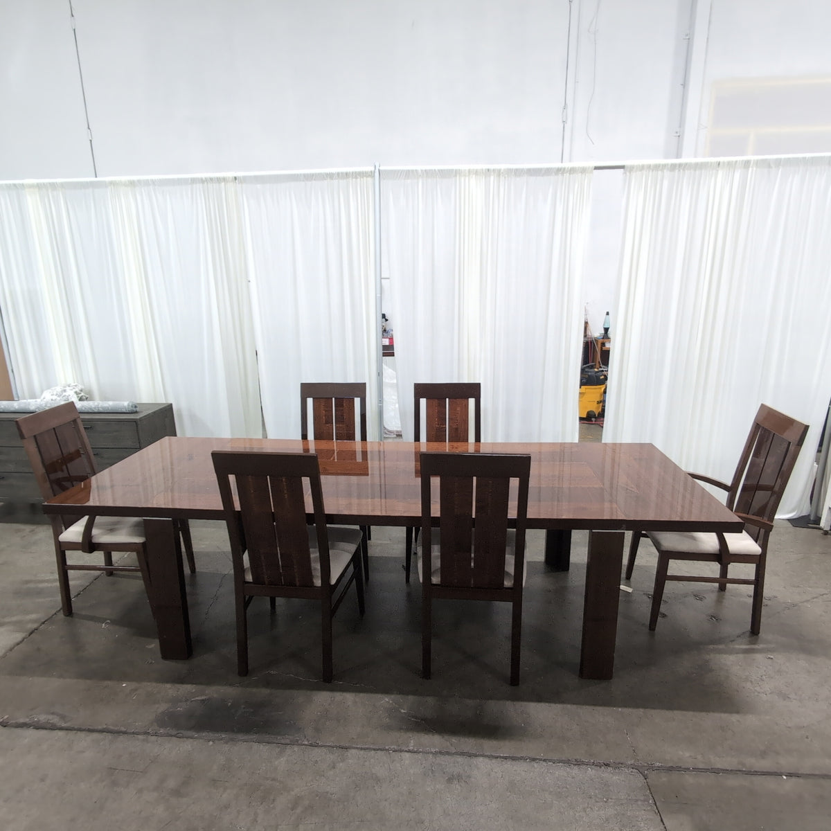 Chestnut brown dining table with 6 matching chairs