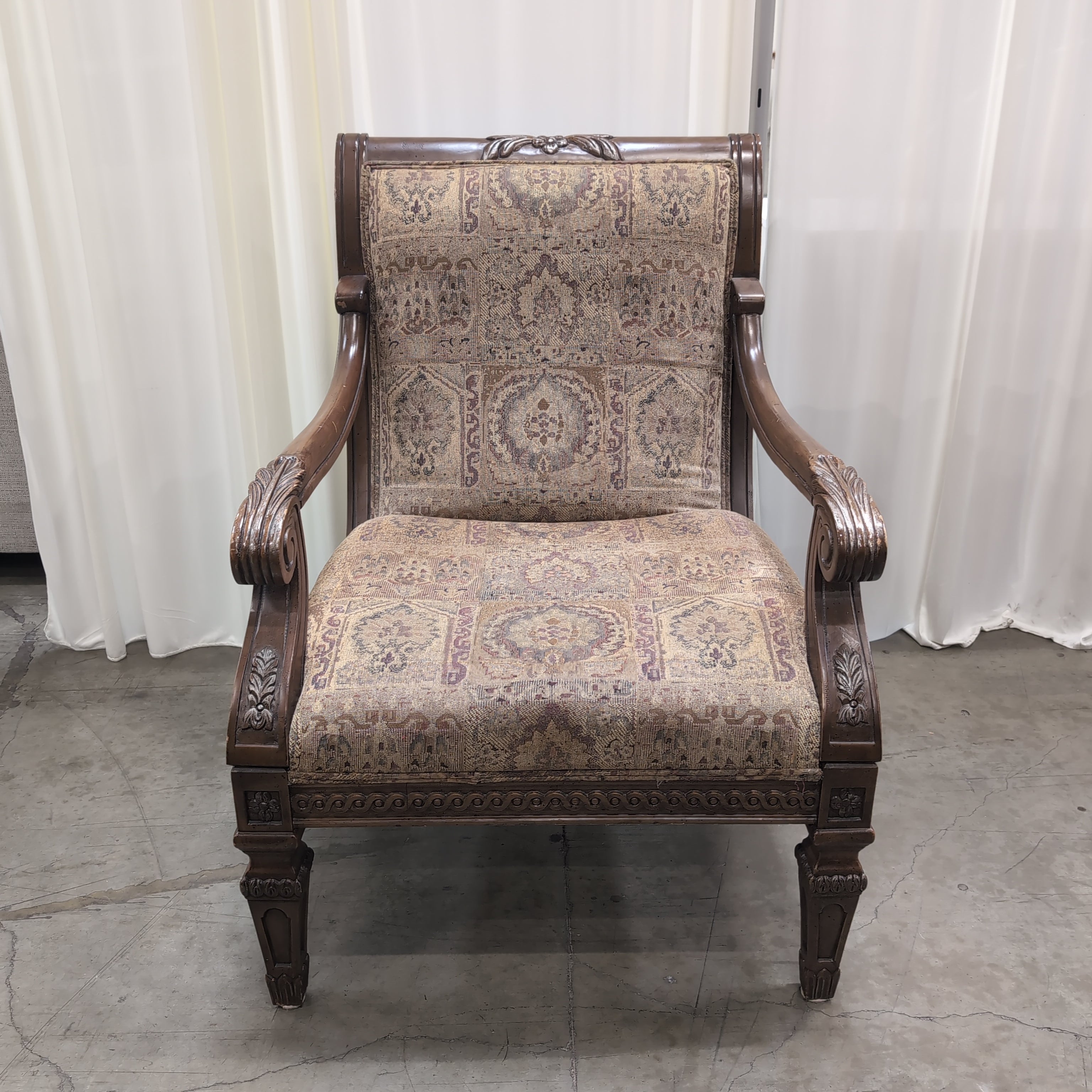Traditional Carved Wood Accent Chair with Patterned Upholstery