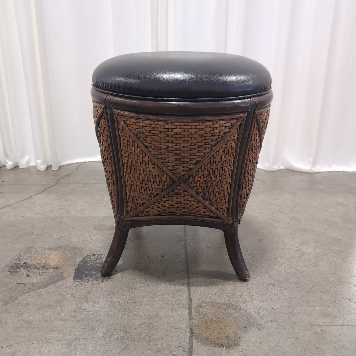 Round Woven Rattan Ottoman with Dark Upholstery