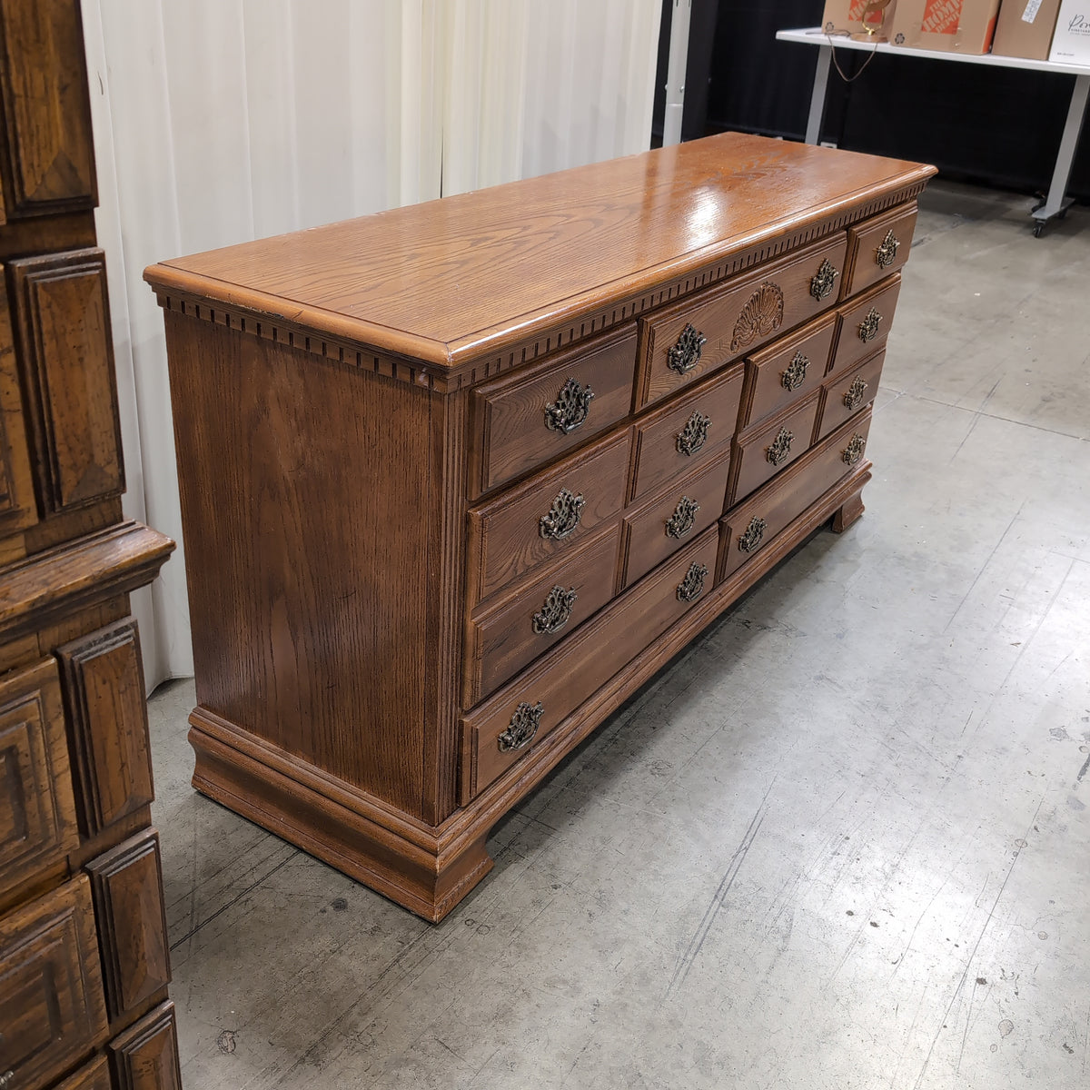 Traditional Brown Wood Dresser with Ornate Hardware