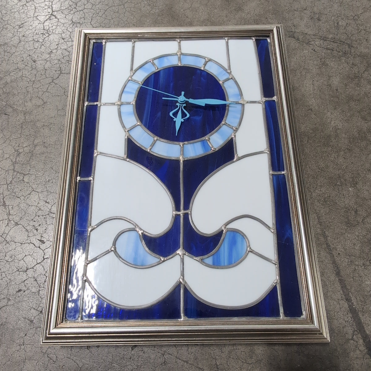 Blue and White Stained Glass Wall Clock
