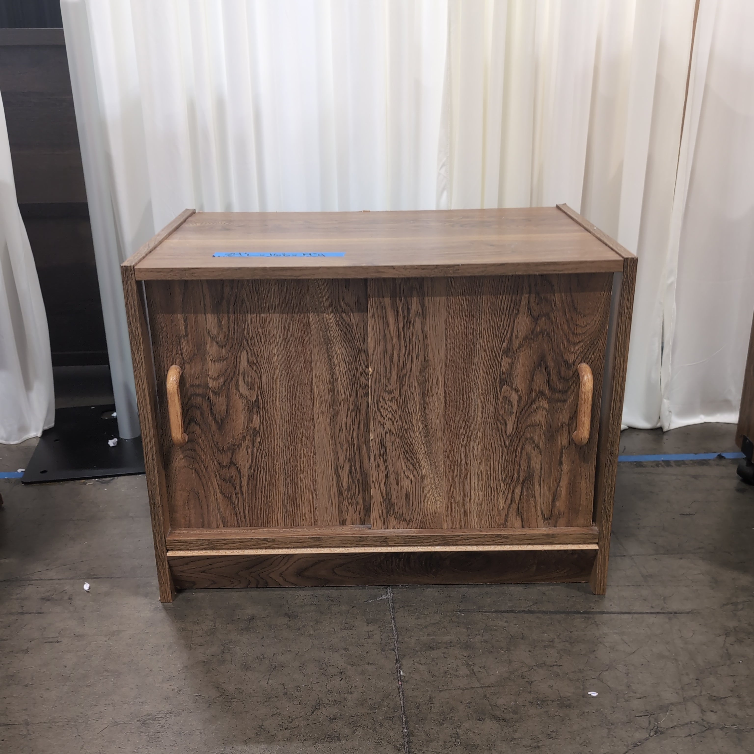 Brown Wood Two-Door TV Stand