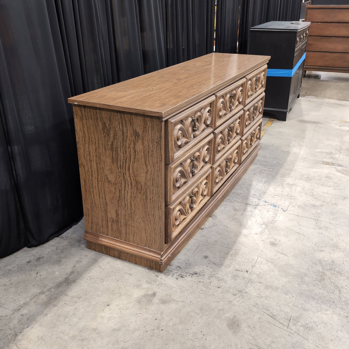 Ornate Carved Brown Wood Nine-Drawer Dresser