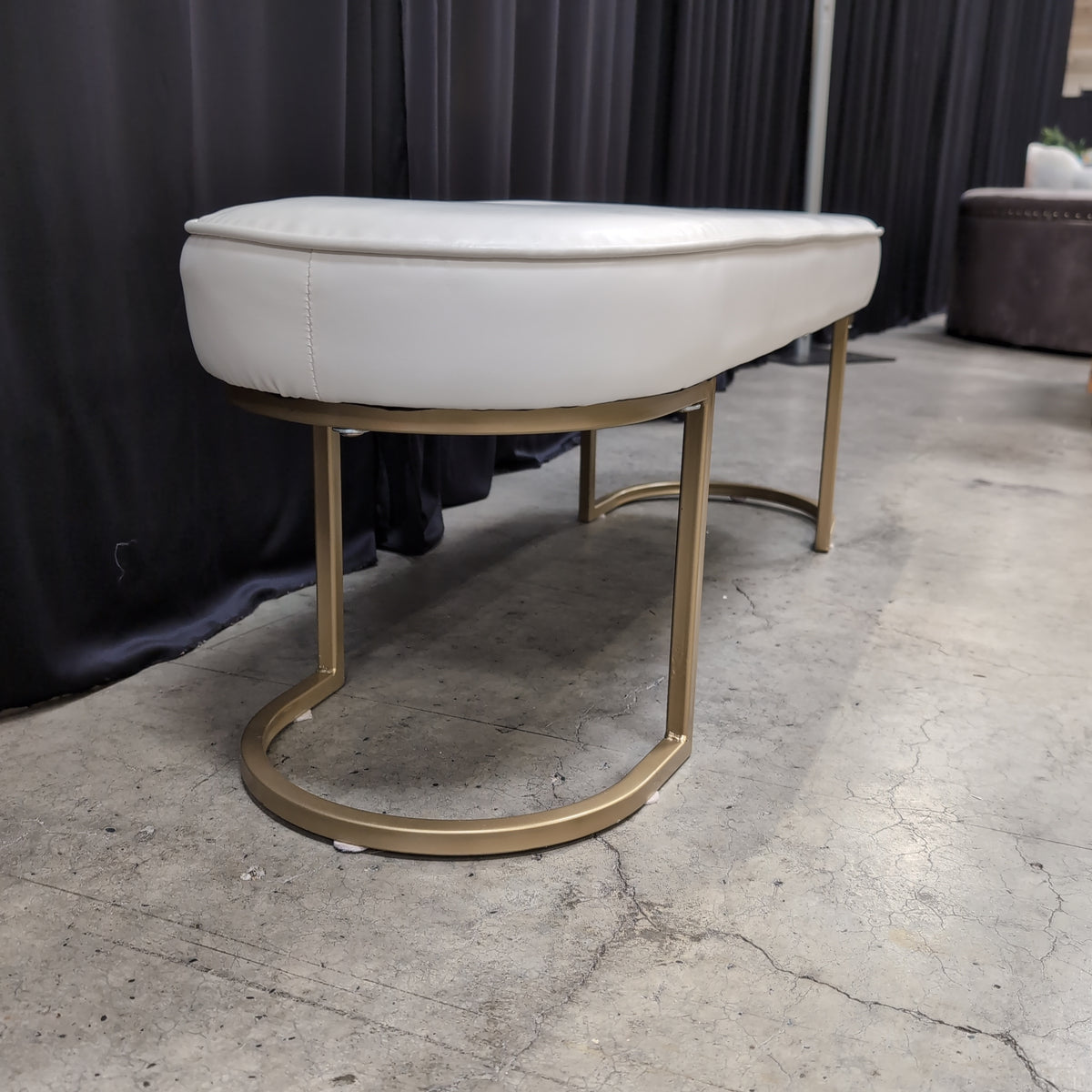 White Upholstered Oval Bench with Gold Base