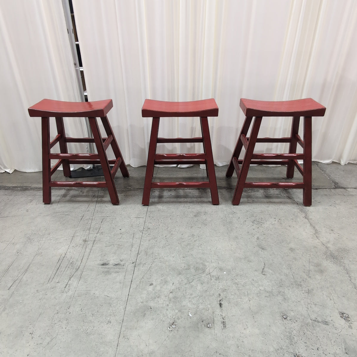 Red Wood Saddle Seat Bar Stool