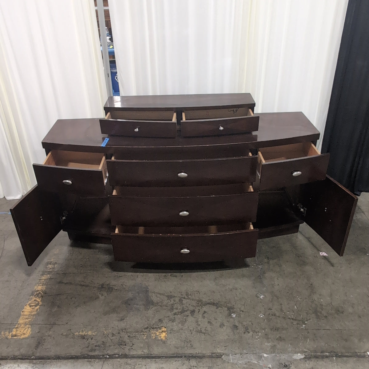 Dark Brown Curved Front Seven-Drawer Dresser