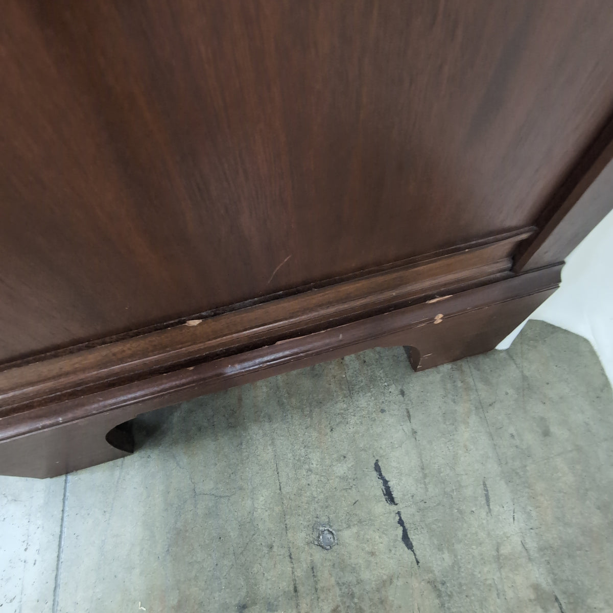 Brown Wood Six-Drawer Dresser with Ornate Hardware