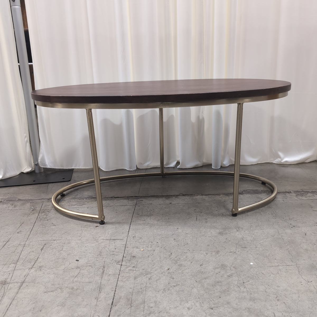 Oval Dark Wood Coffee Table with Gold Metal Base