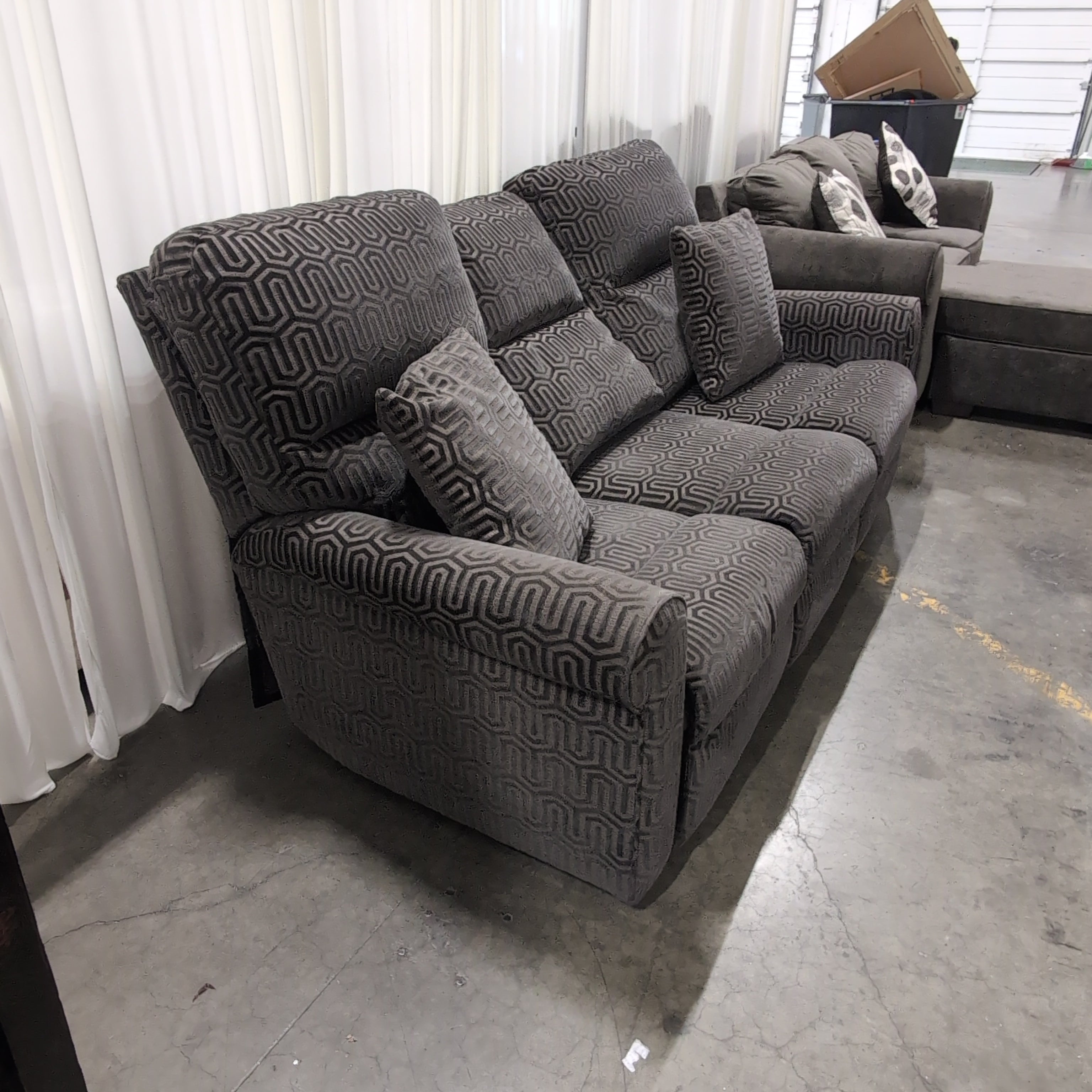 Charcoal Fabric Reclining Couch with Geometric Pattern