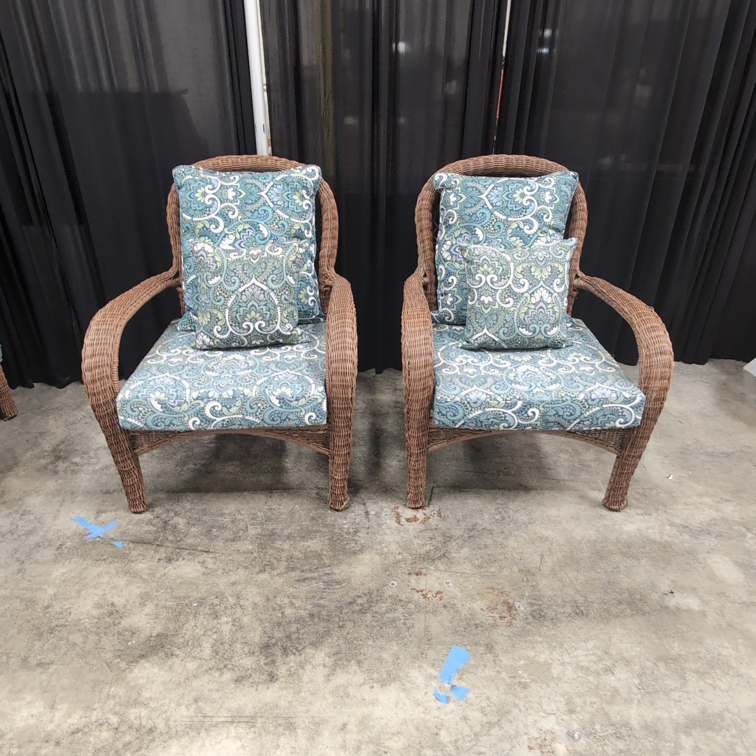 Pair of Brown Wicker Outdoor Chair with Patterned Cushions