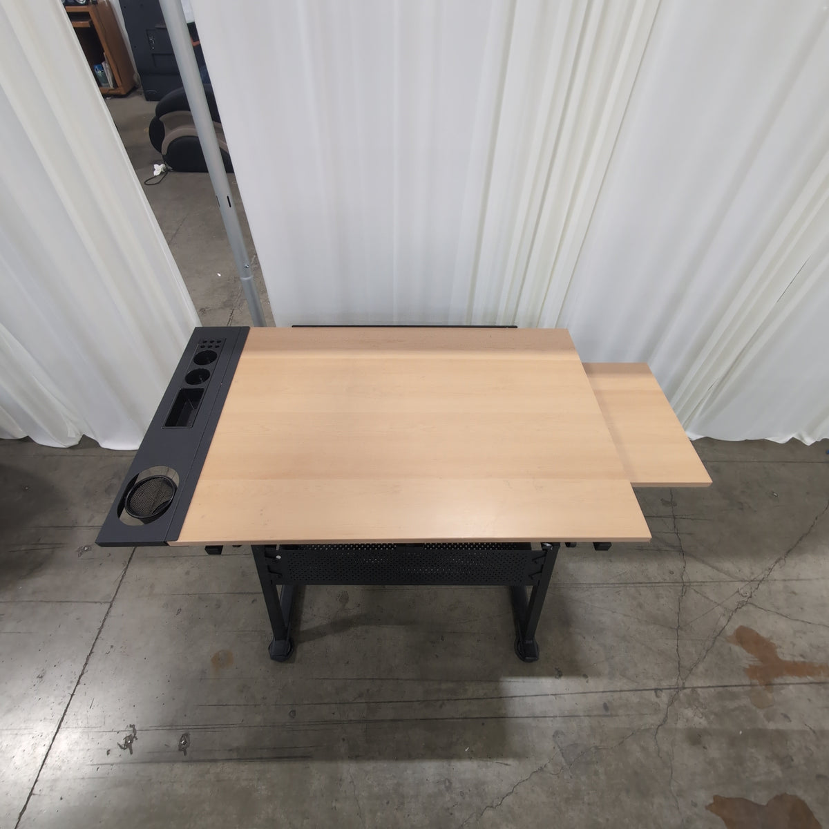 Adjustable Light Wood-Tone Drafting Desk with perforated shelf
