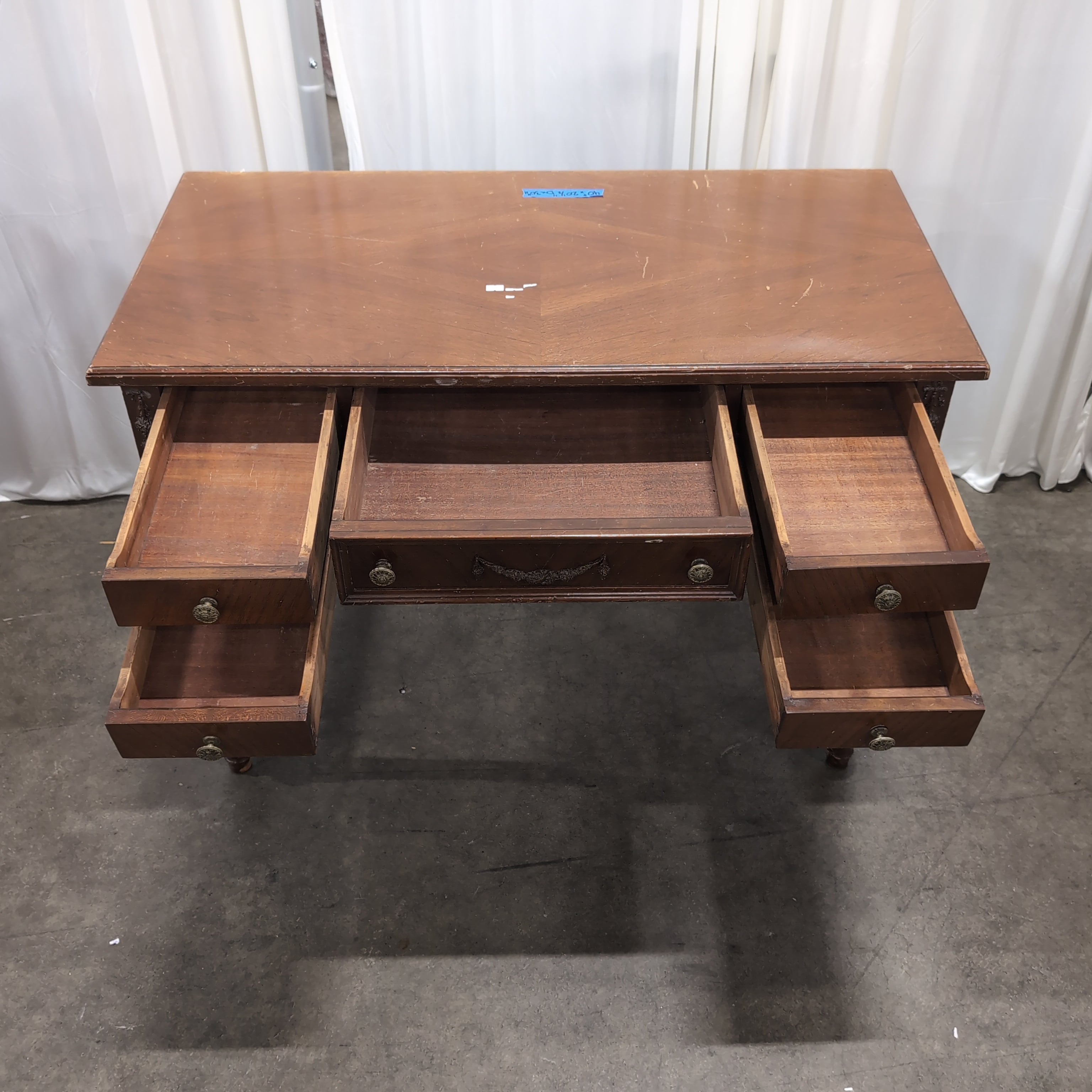 Traditional Reddish-Brown Wood Desk with Ornate Legs