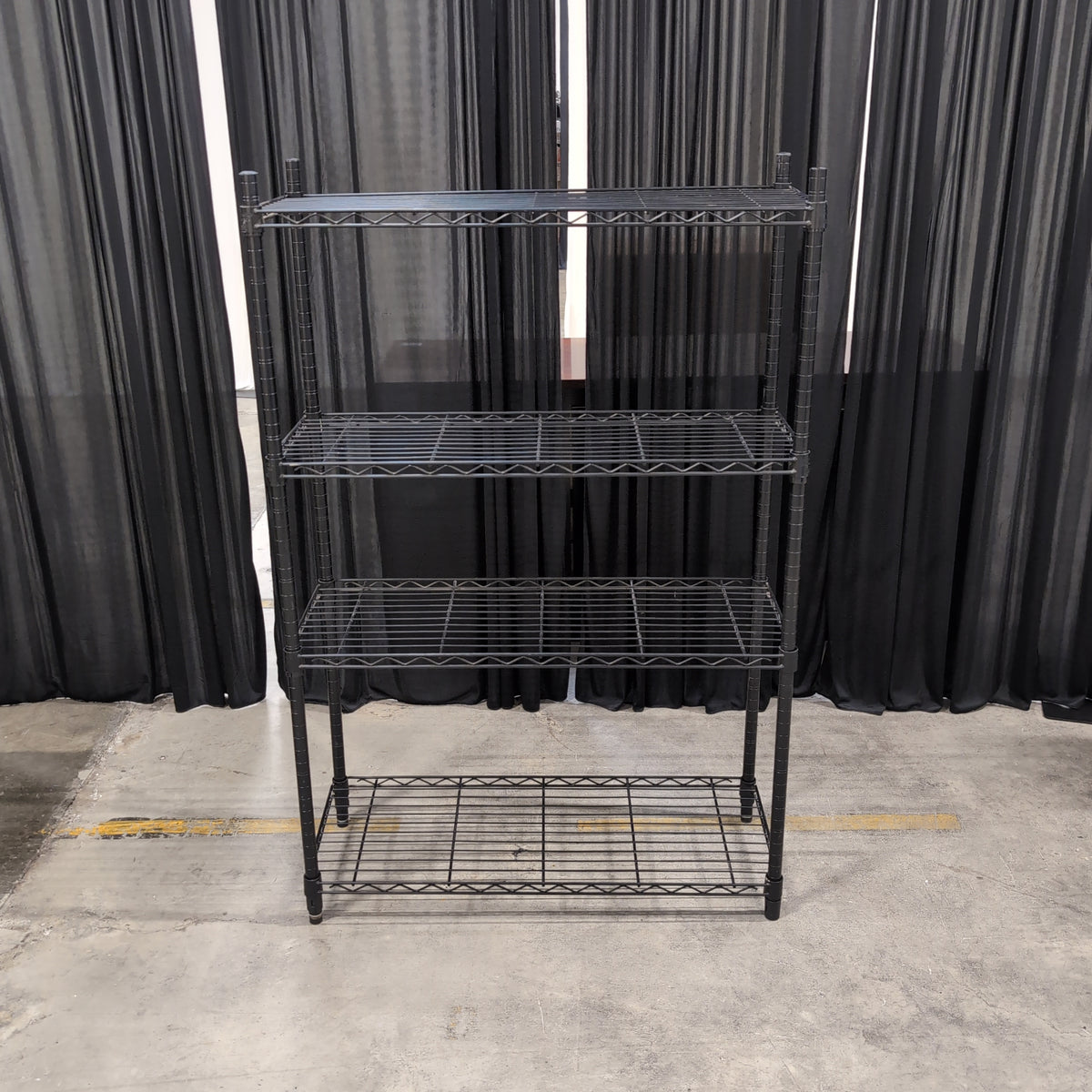 Black Four-Tier Wire Shelving Unit in Metal