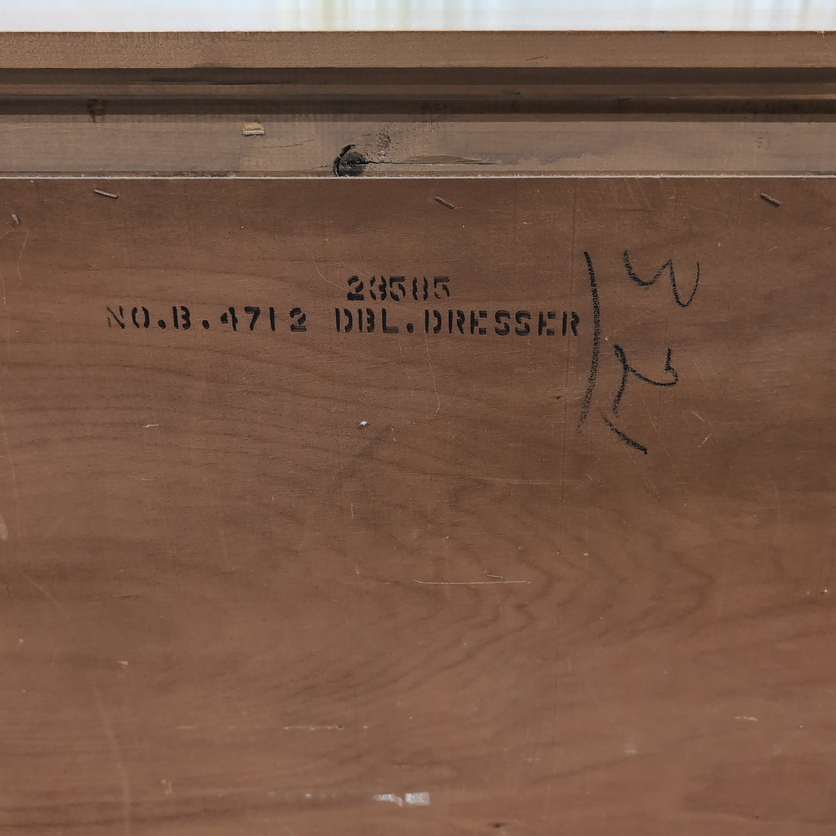 Traditional Honey Tone Nine-Drawer Dresser with Ornate Hardware