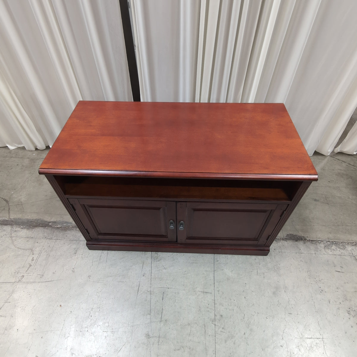 Cherry Finish Wood TV Stand with Paneled Doors