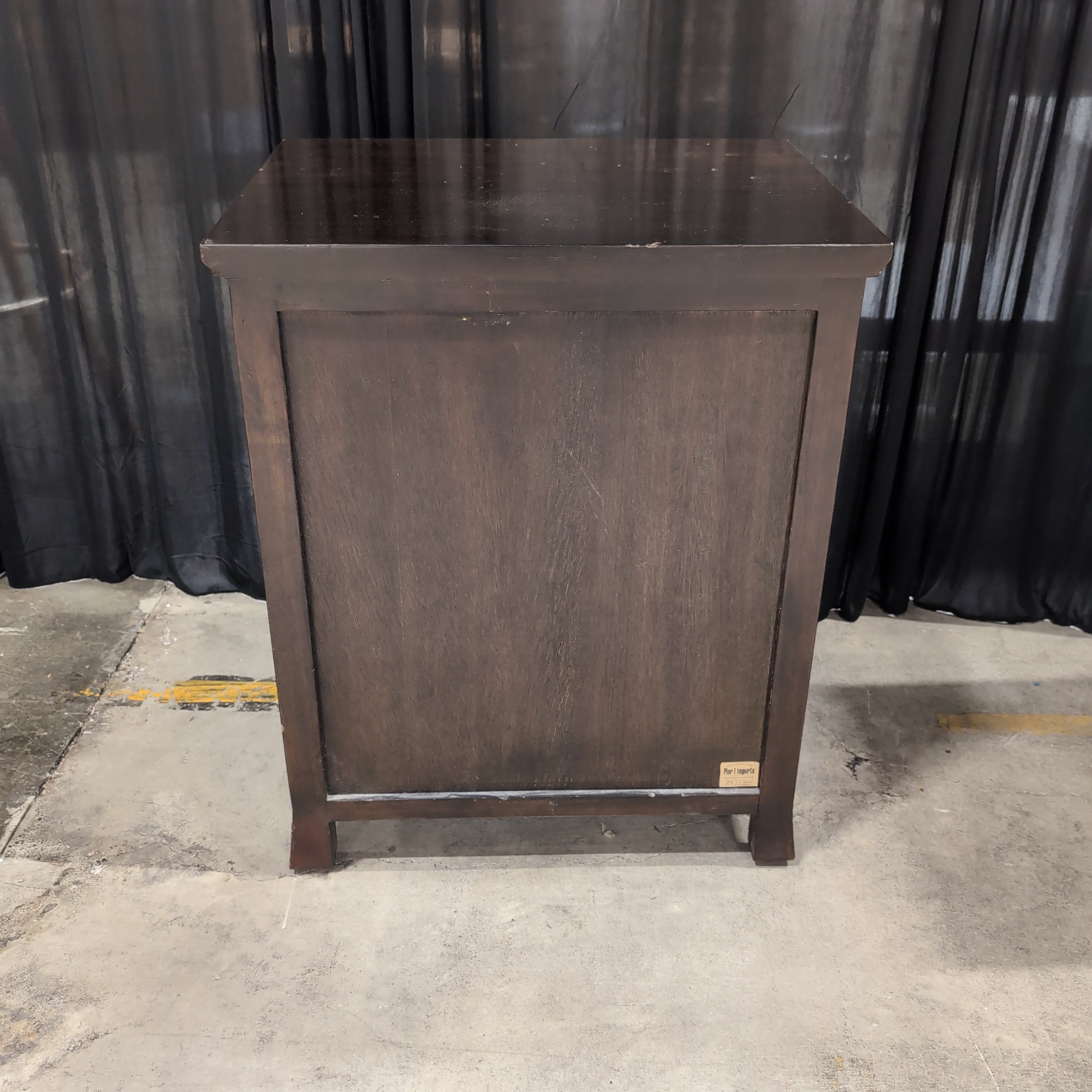 Dark Wood Nightstand with Carved Drawer Front