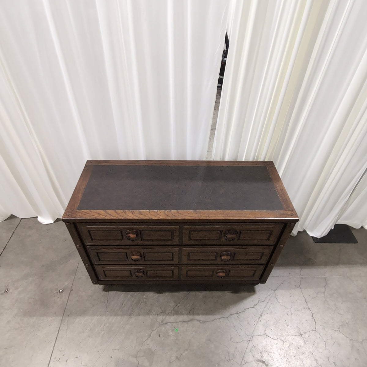 Traditional Dark Wood Four-Drawer Dresser with Ornate Pulls