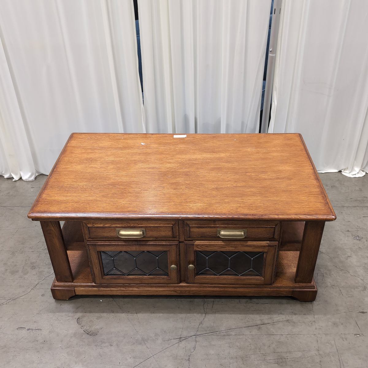 Brown Wood Coffee Table with Patterned Glass Doors