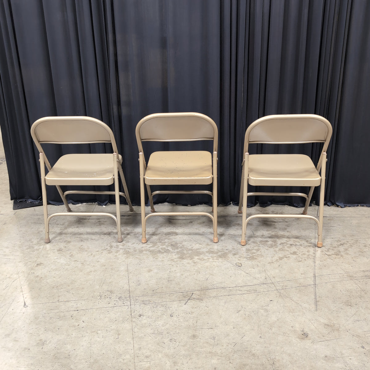 Set of Three Tan Metal Folding Chair with Rubber Feet