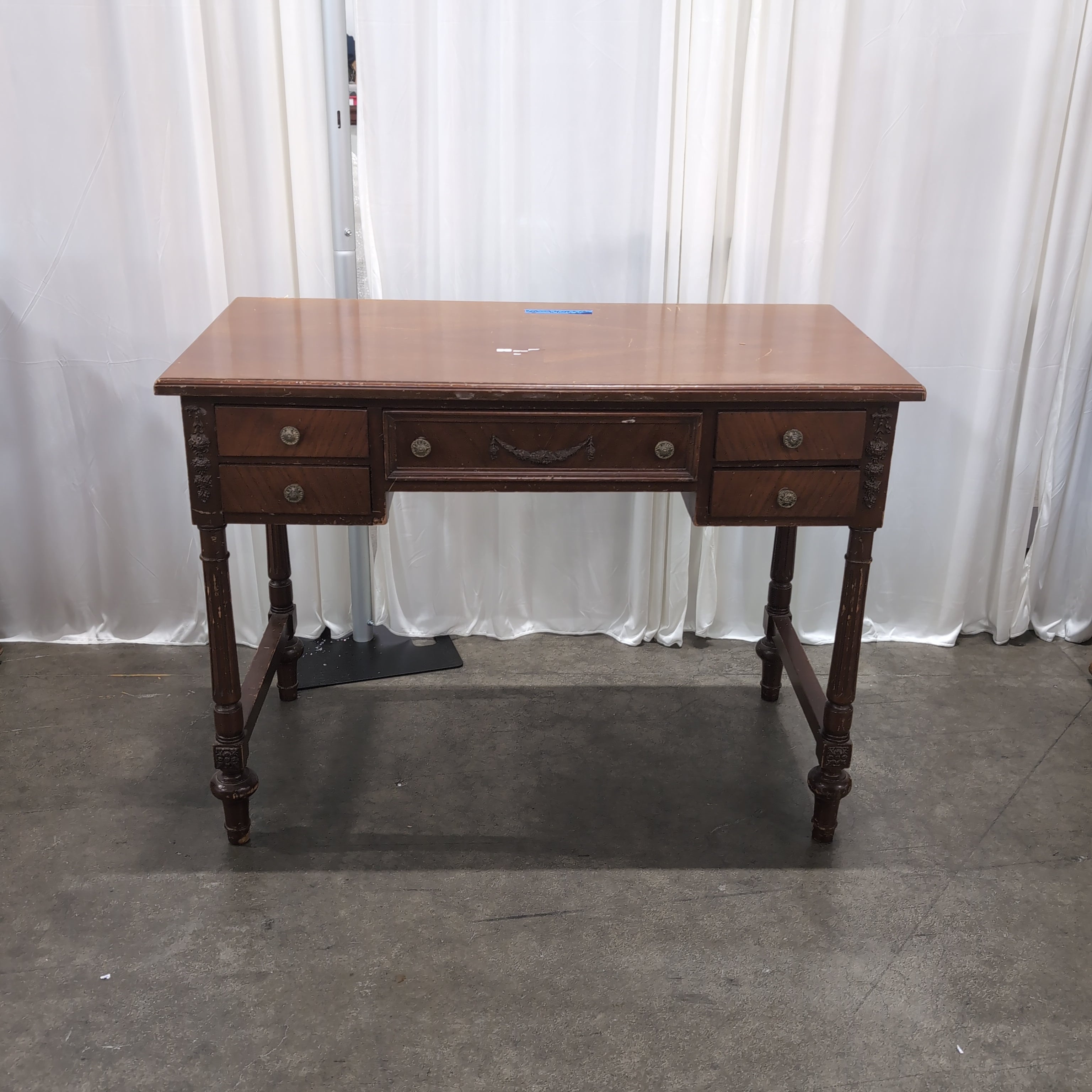 Traditional Reddish-Brown Wood Desk with Ornate Legs